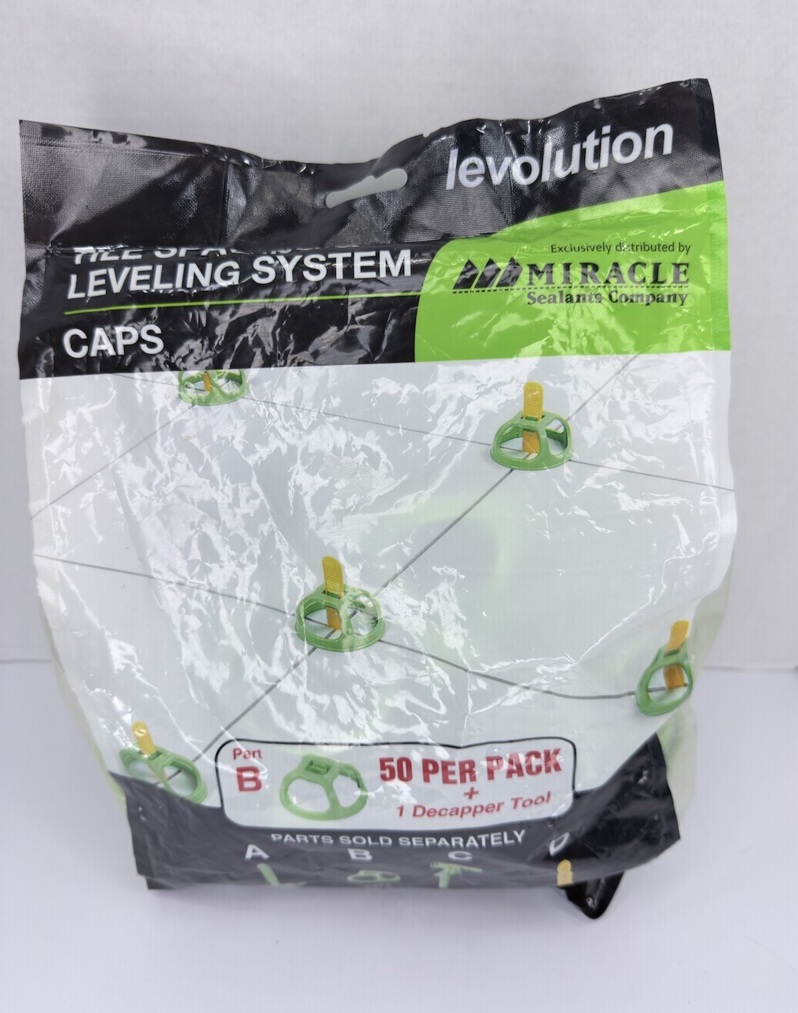 Levolution Tile spacing and Leveling System Caps Part B  50 Pc Bag + Tool