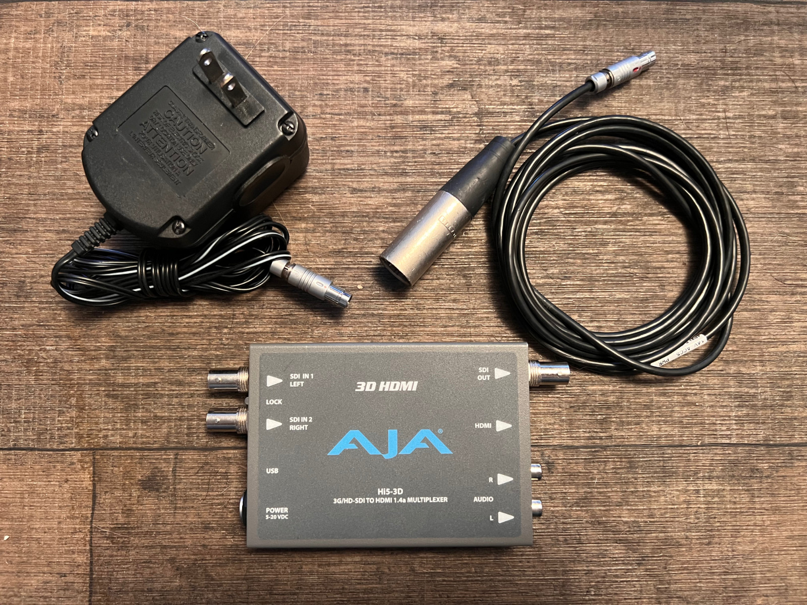 AJA   HI5-3D   HD-SDI and 3G-SDI to HDMI 1.4a Multiplexer With OEM Power Supply