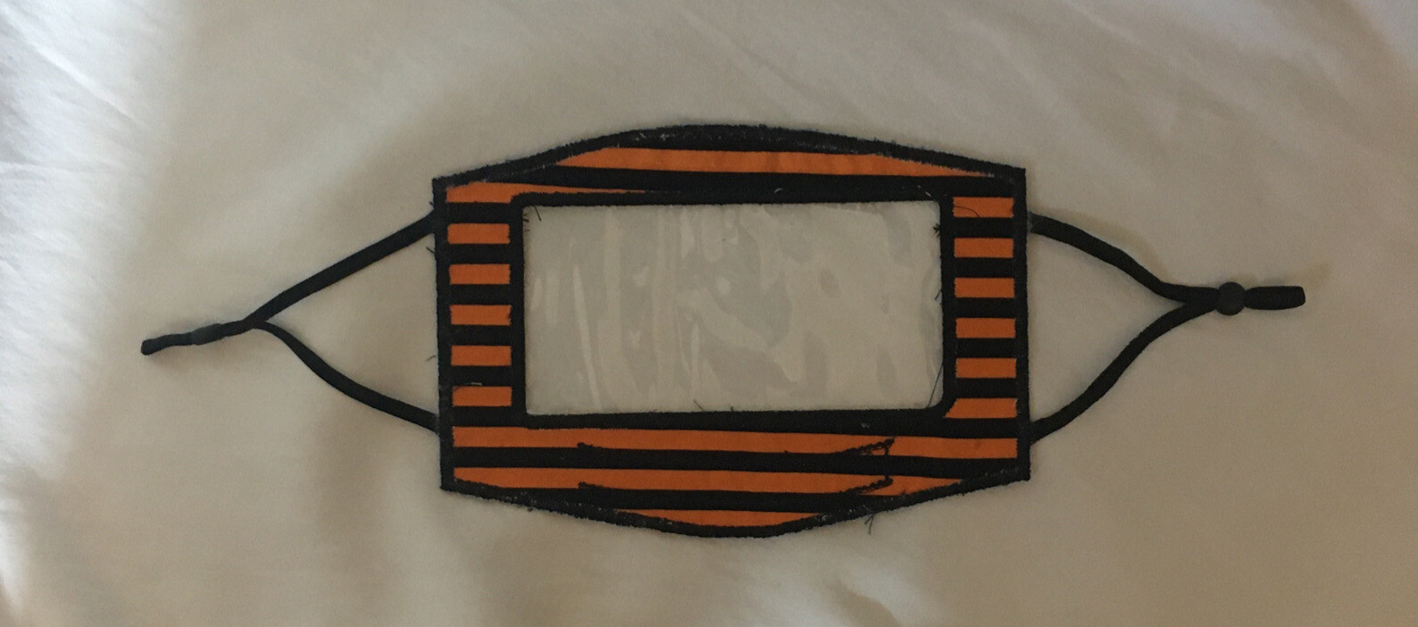 New Orange and Black Striped Face Mask, New with Clear Plastic Area to See Mouth