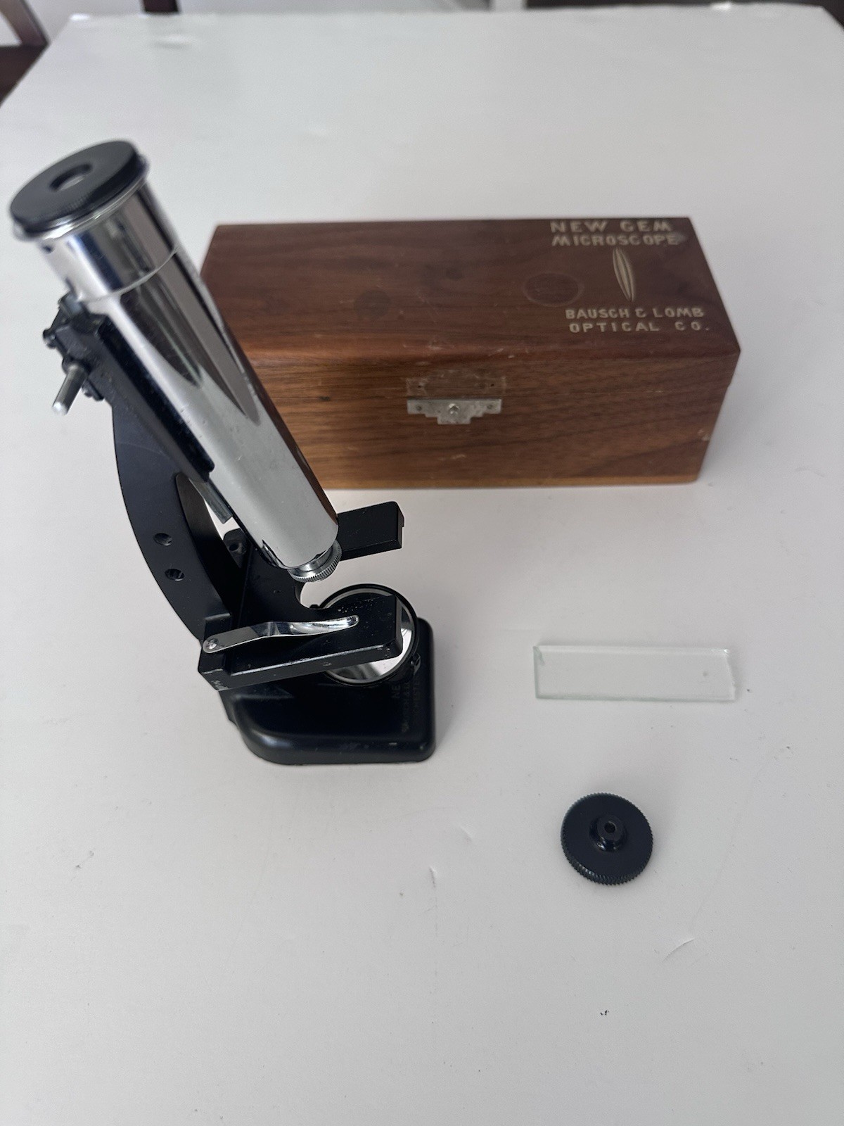 Vintage Bausch & Lomb “New Gem” Microscope with original wooden box.