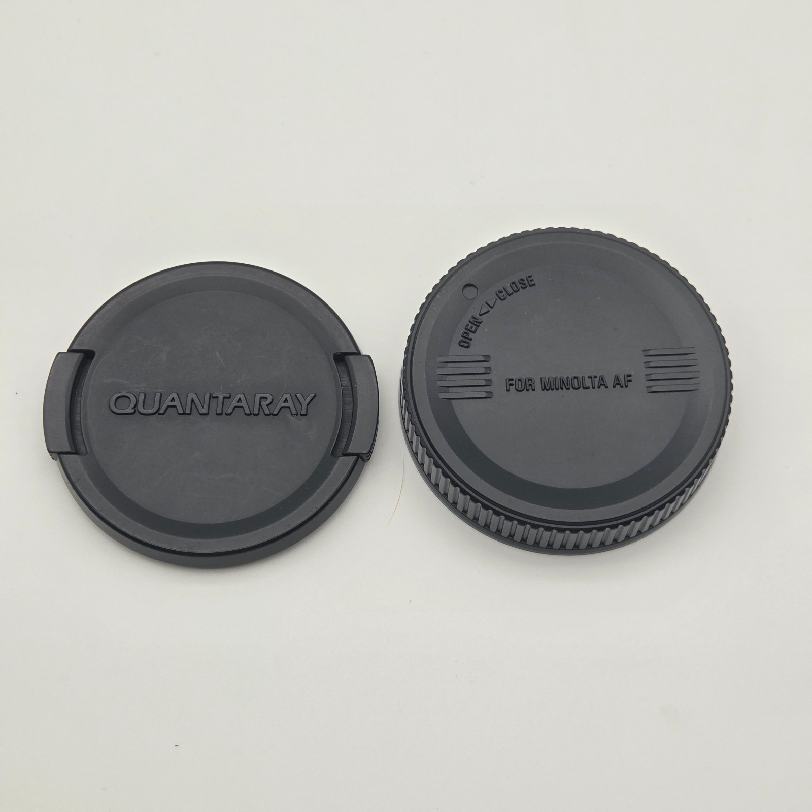 Set of 2 Lens Covers- 1 Snap On and a Minolta AF twist