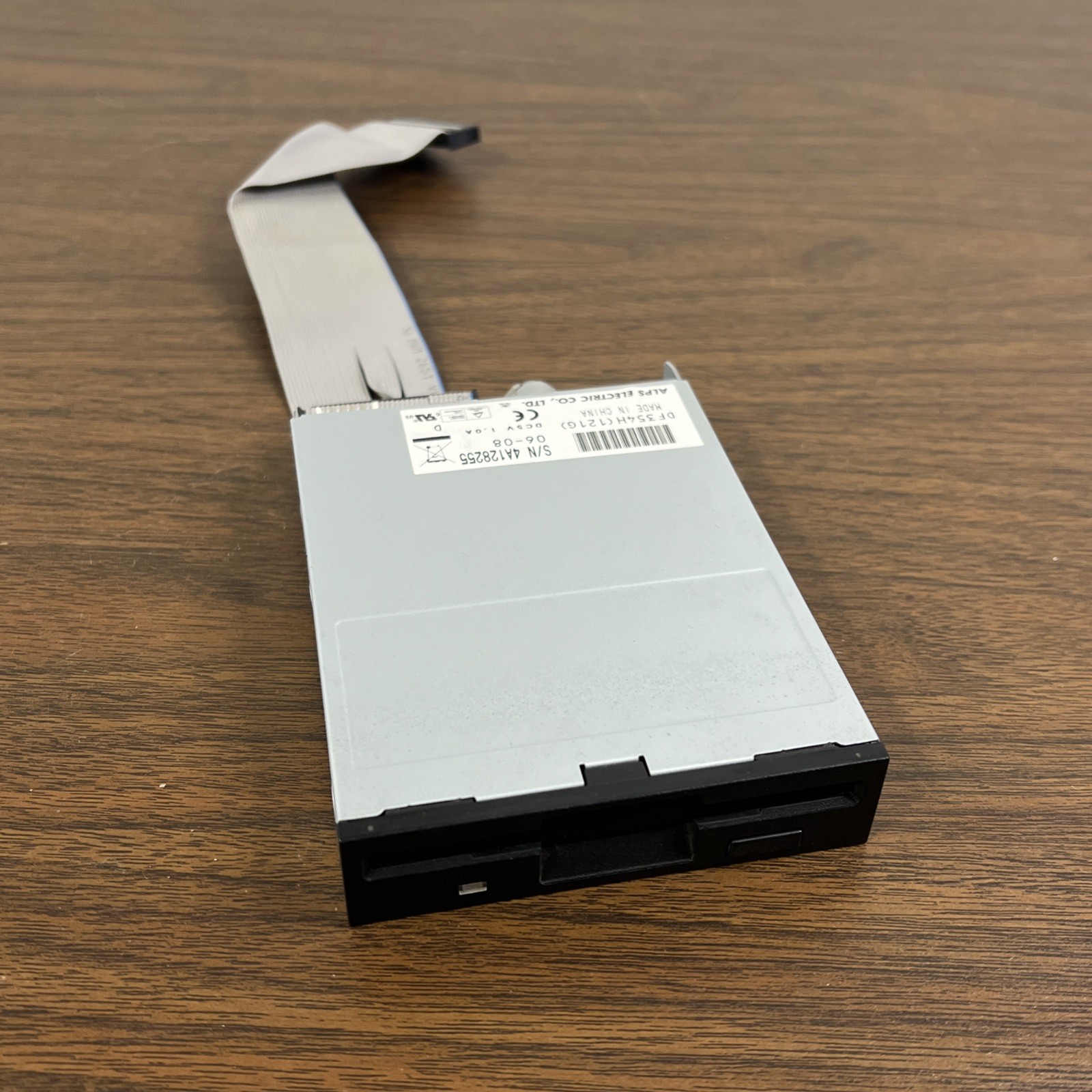 3-1/2" Floppy Disk Drive 1.44 MB ALPS FDD DF354H Black Bezel With Ribbon Cable