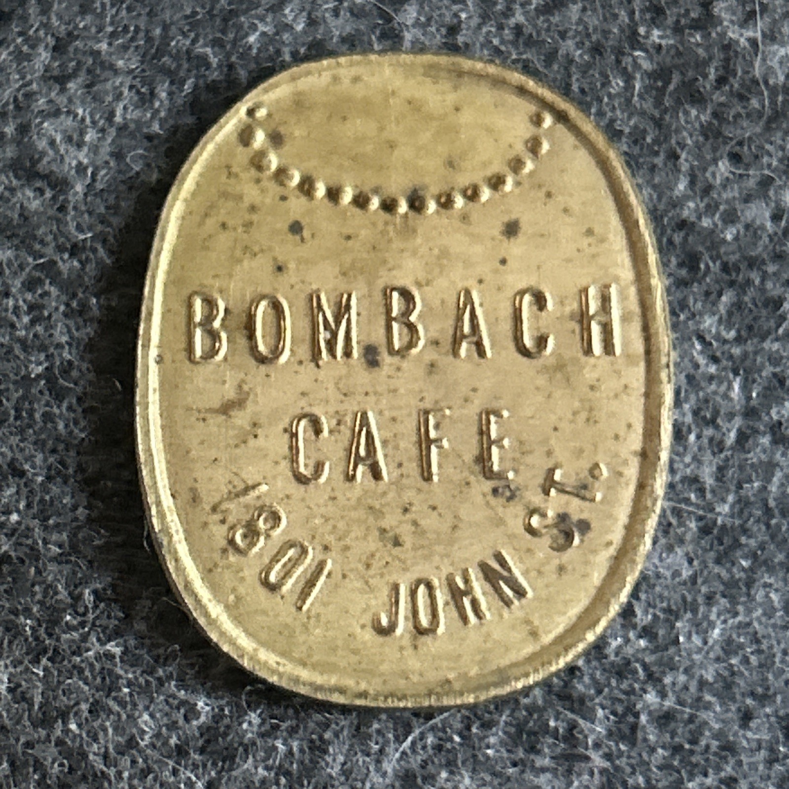 Cincinnati Ohio OH Trade Token 5¢ Bombach Cafe 1801 John St. 1940