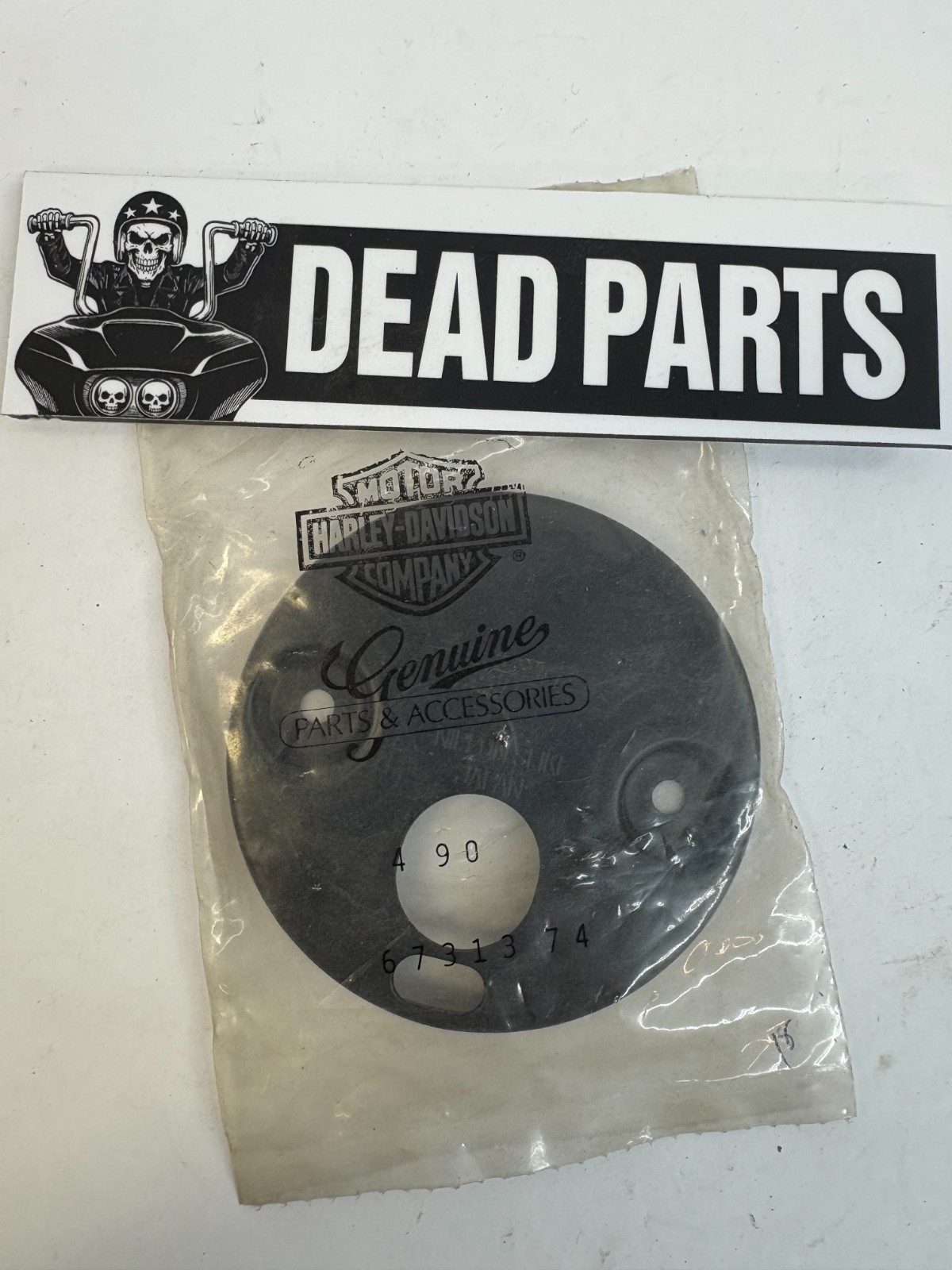 Harley NOS OEM black Nippon gauge backing plate 67313-74