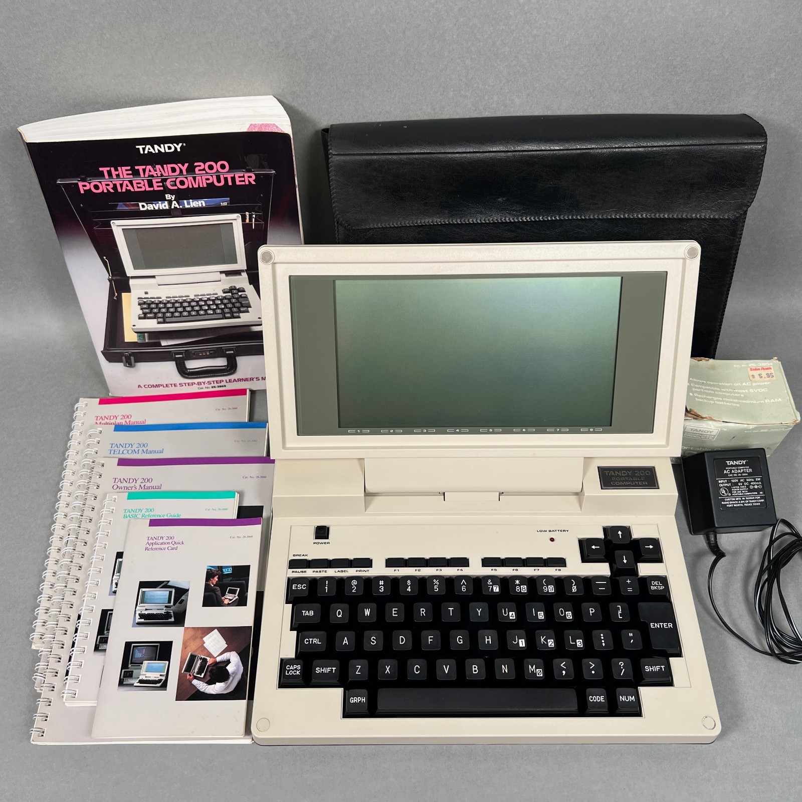 Tandy 200 Portable Computer, Power Adapter, Case, Book, Owner's Manuals WORKING