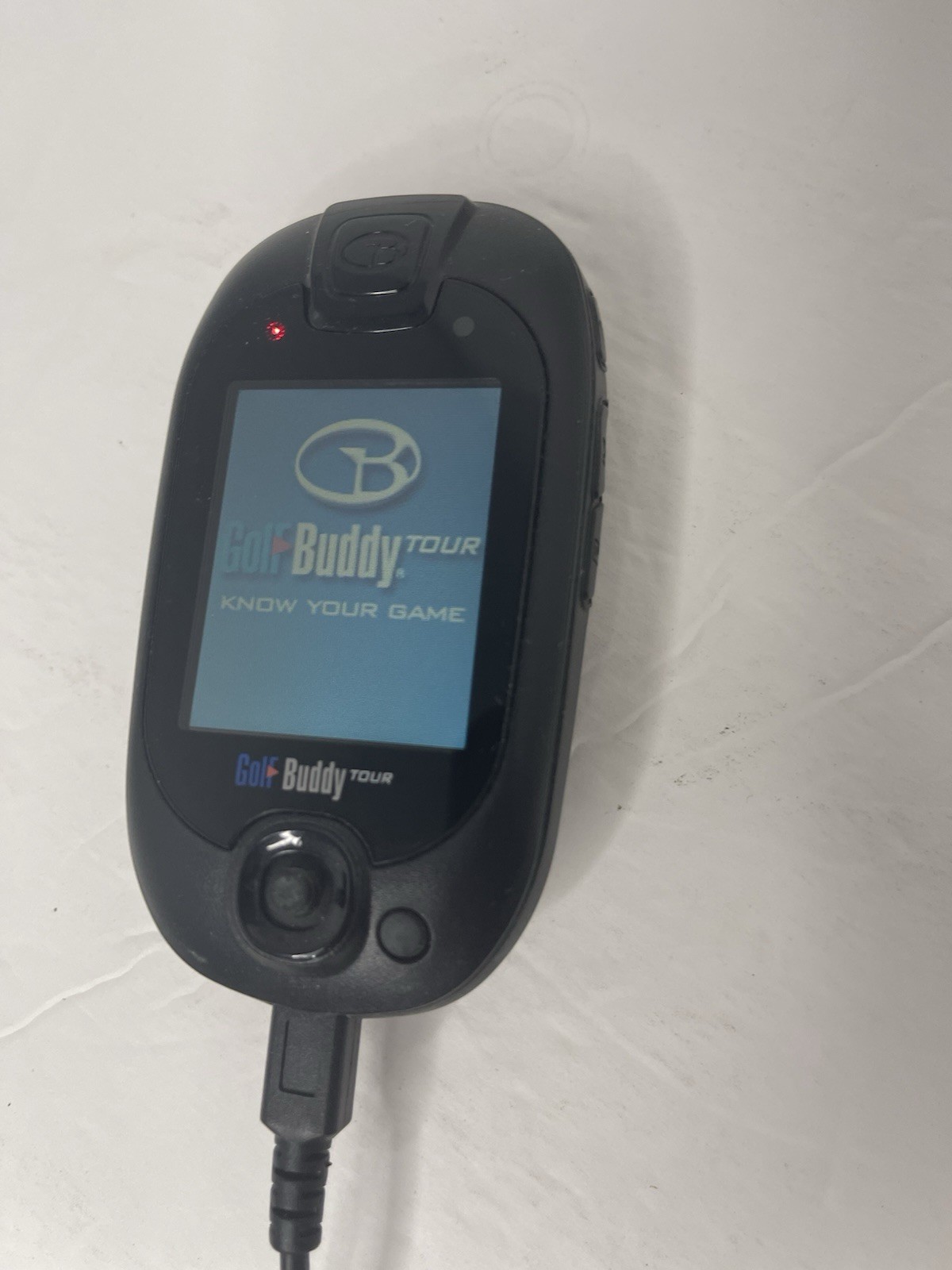 Golf Buddy Tour with Manuals, Belt Clip, Wall Charger, and USB charging cable.