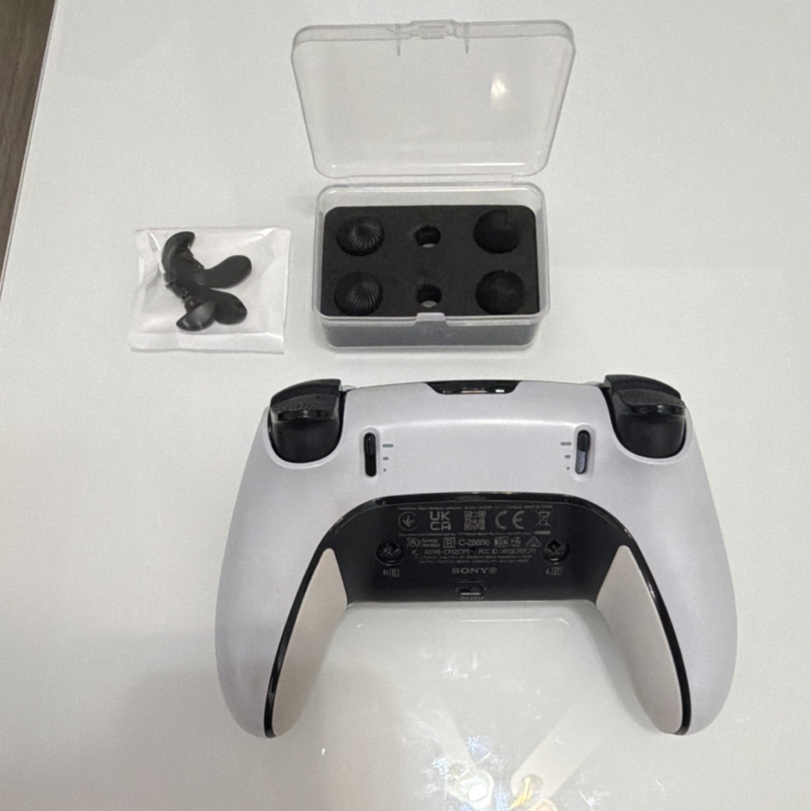 Sony DualSense Wireless Controller Bundle with Thumb Grips, Trigger Attachments…