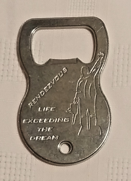 Rendezvous Life Exceeding the Dream / Chain Saw Carver's Bottle Opener Preowned