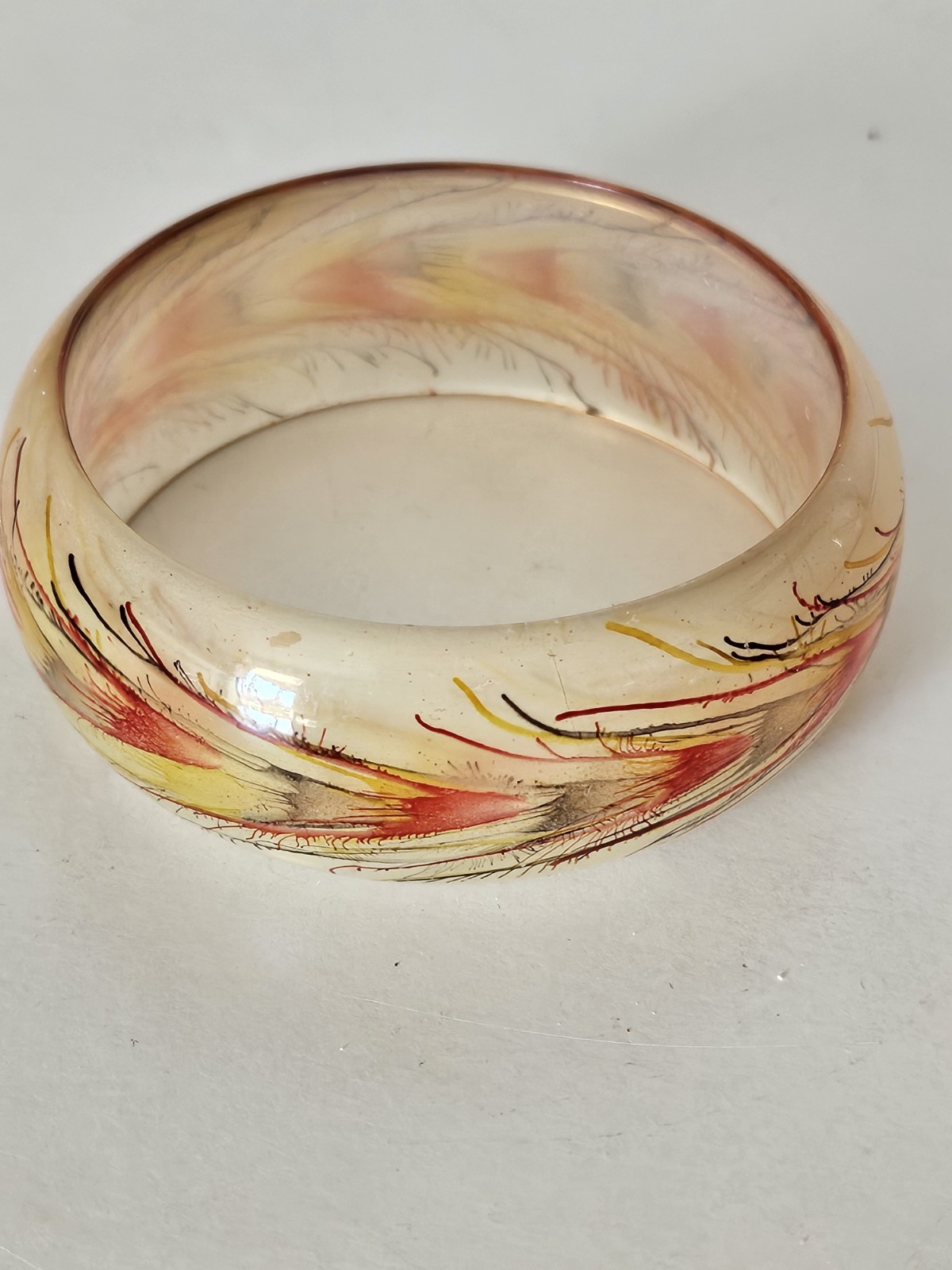 Bracelet Cuff Bangle Slip On Acrylic Plastic Frosted W Orange/brwn Feather Print