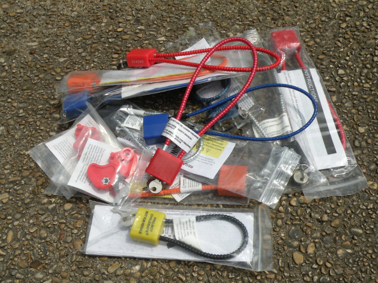 Lot of 13 Assorted Verity Gun Safety Locks
