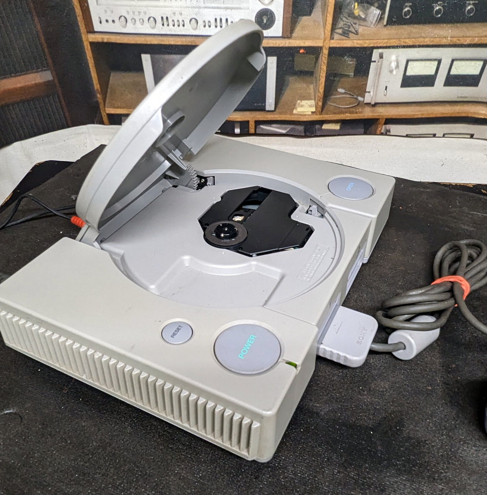 Sony Playstation SCPH-5501 with controller setup for audiophile CD player use.