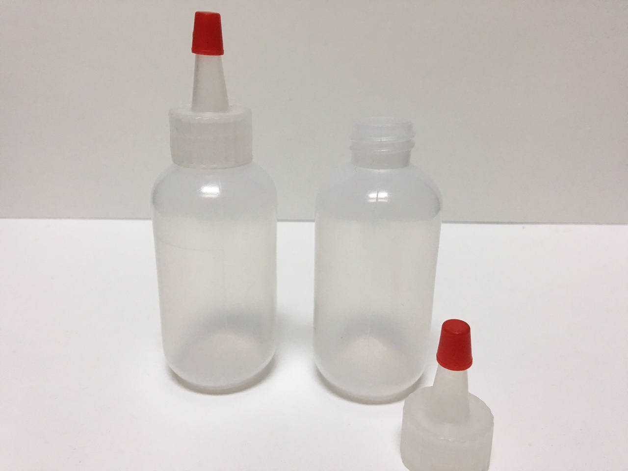 20 pack of 2oz (60mL) Plastic Boston Round Squeeze Bottles with Yorker Caps LDPE