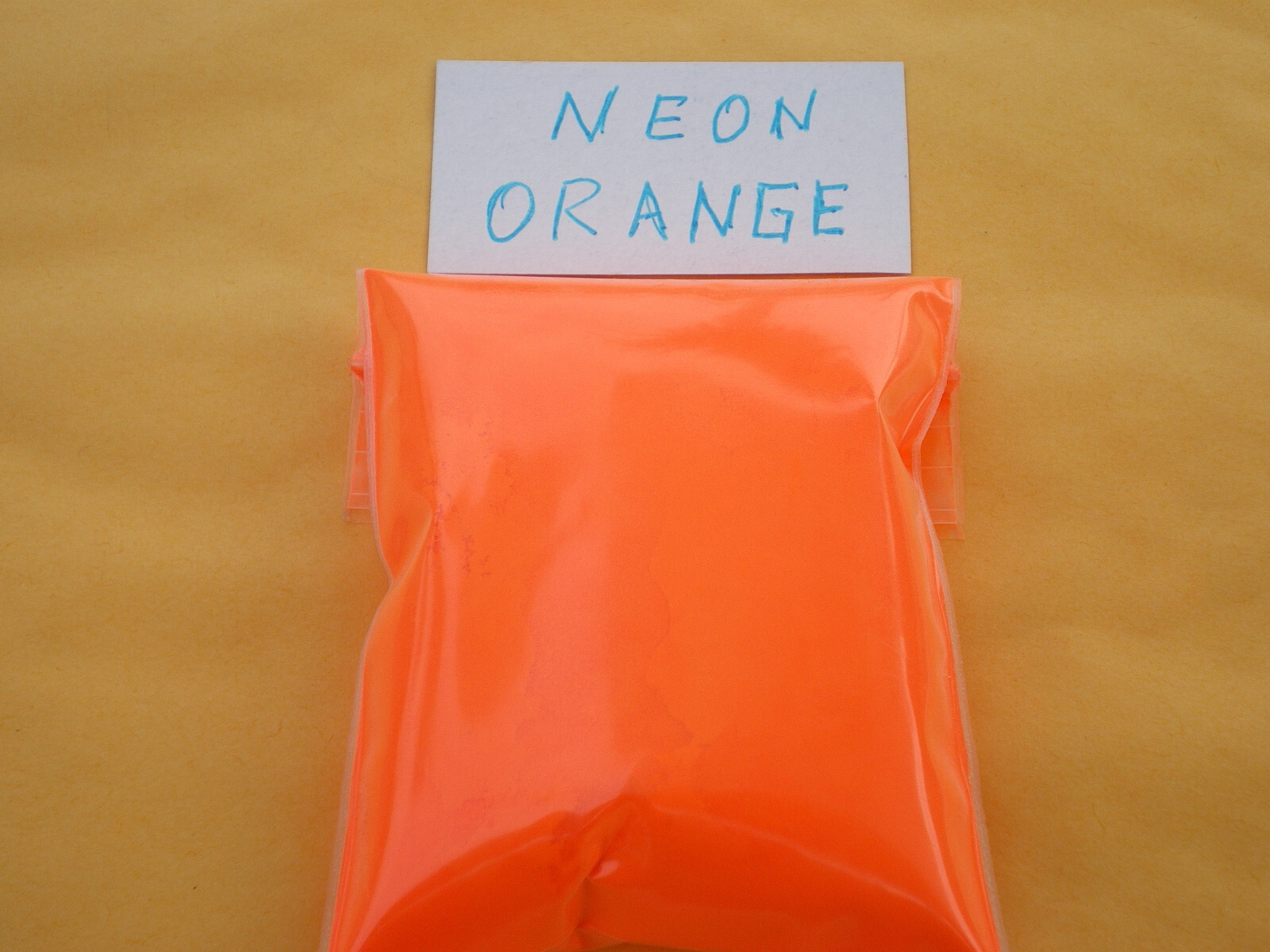 POWDER JIG PAINT, 5 OZ. RESEALABLE BAG, NEON ORANGE