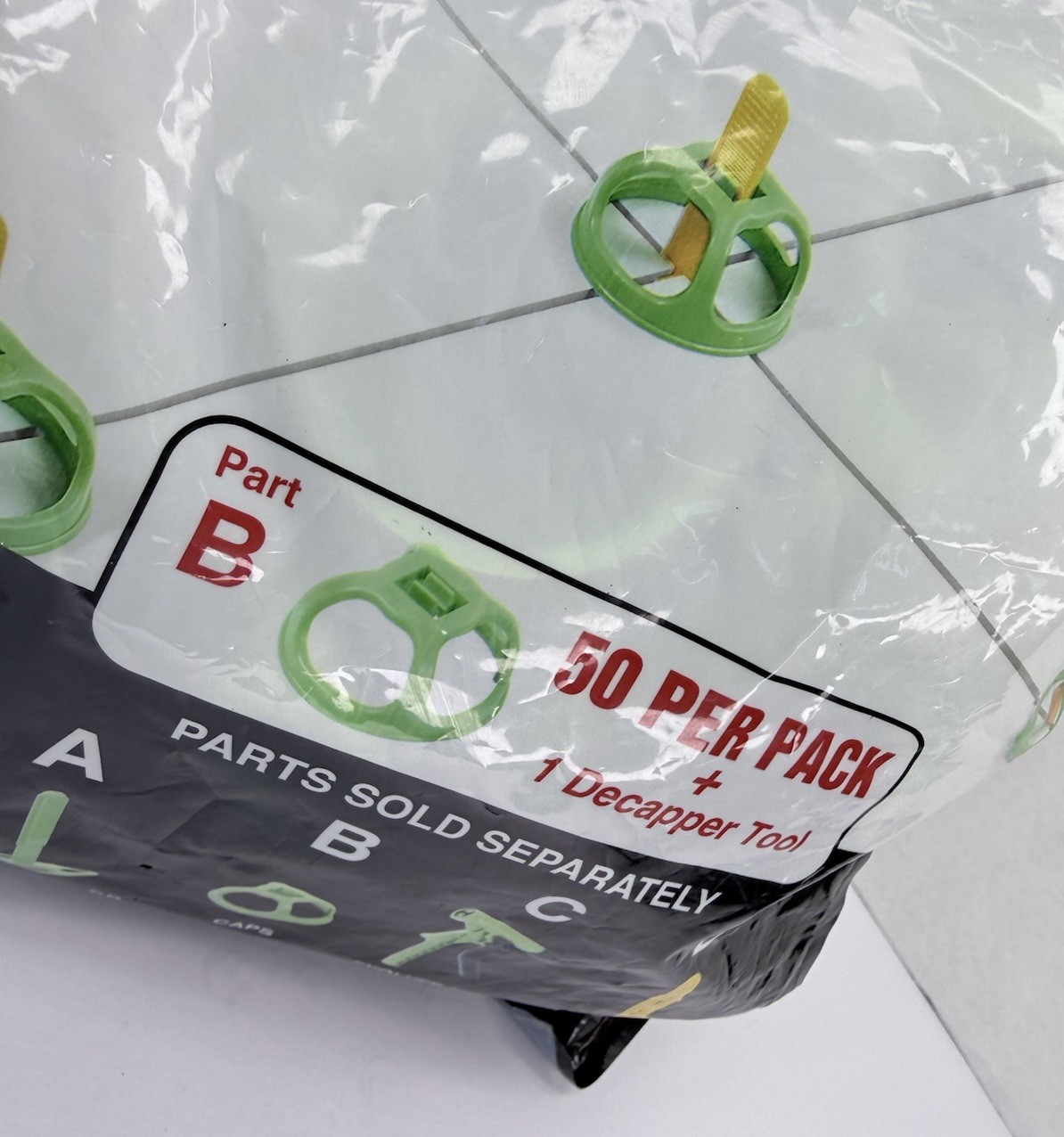 Levolution Tile spacing and Leveling System Caps Part B 50 Pc Bag + Tool
