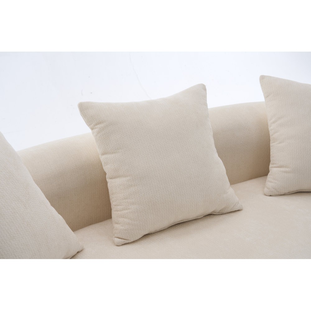 Crescent-shaped sofa, modern low-back design with deep cushions, self-inflating