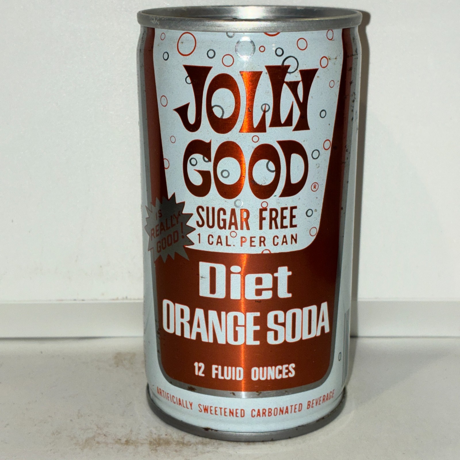 1970's Jolly Good Diet Orange Soda can, crimped steel, bottom opened