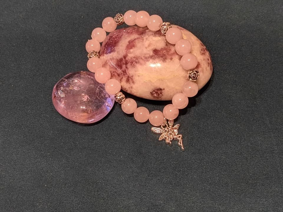 Rose quartz beaded bracelet w/ fairy charm & silver rose spacer beads