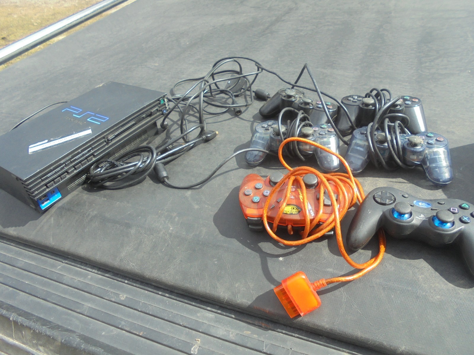 Vintage Sony Playstation 2 with six controllers