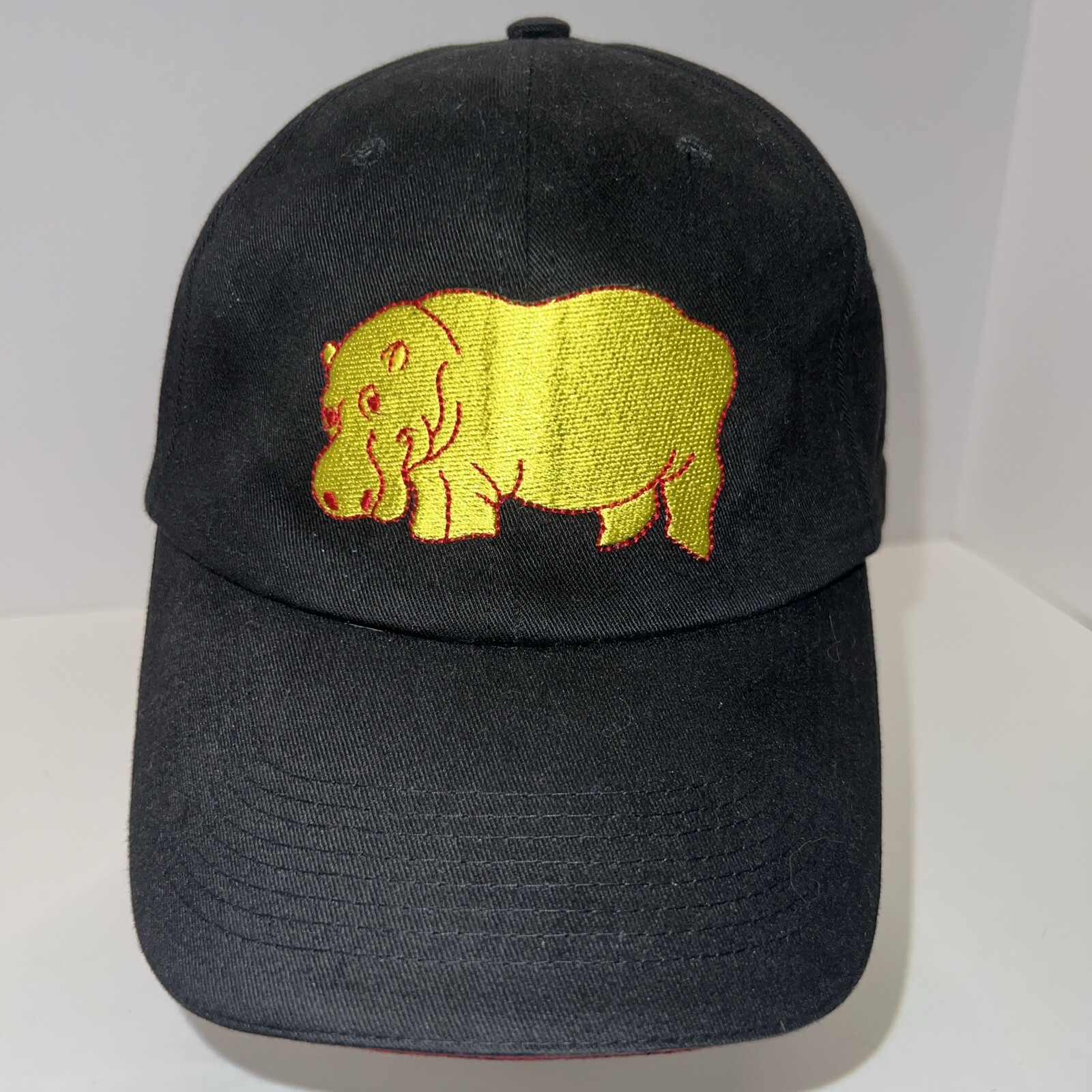 Hippowings Hat Cap Black w Yellow Hippo outlined in Red on the Front. Hook Loop
