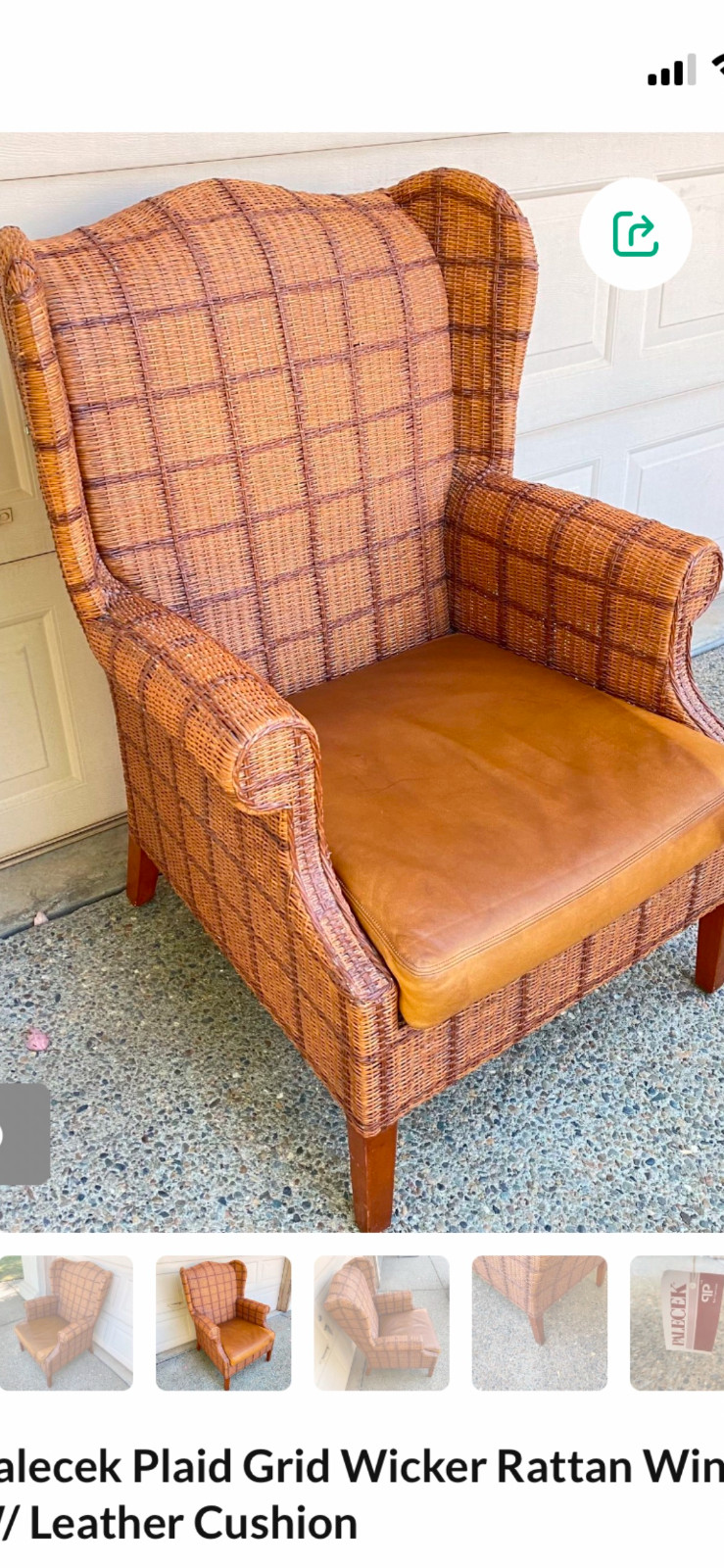 Stunning Palacek wicker chair, rare leather cushion