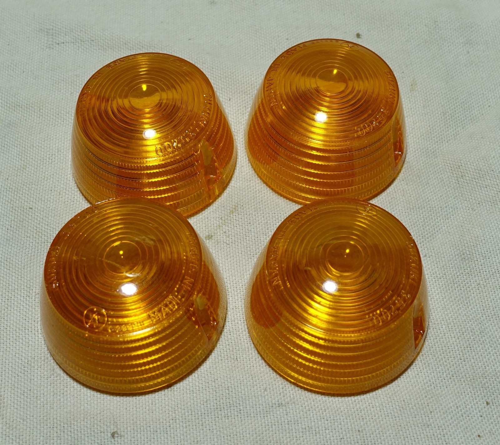 SUZUKI A50 A100 GT250 T250 T305 T500 TS250  TS125 RV125 TS WINKER LENS NOS 4PCS