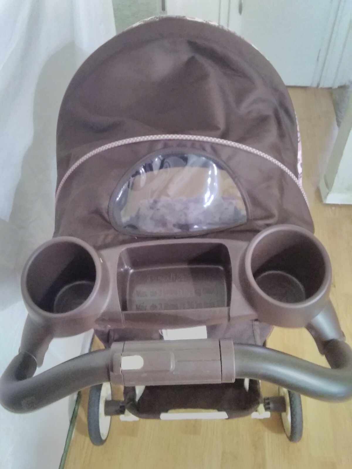 Graco Stroller walk behind with built in cupholders 