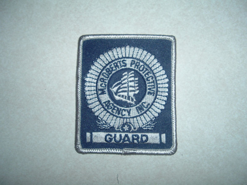 PATCH SECURITY McROBERTS PROTECTIVE AGENCY INC GUARD