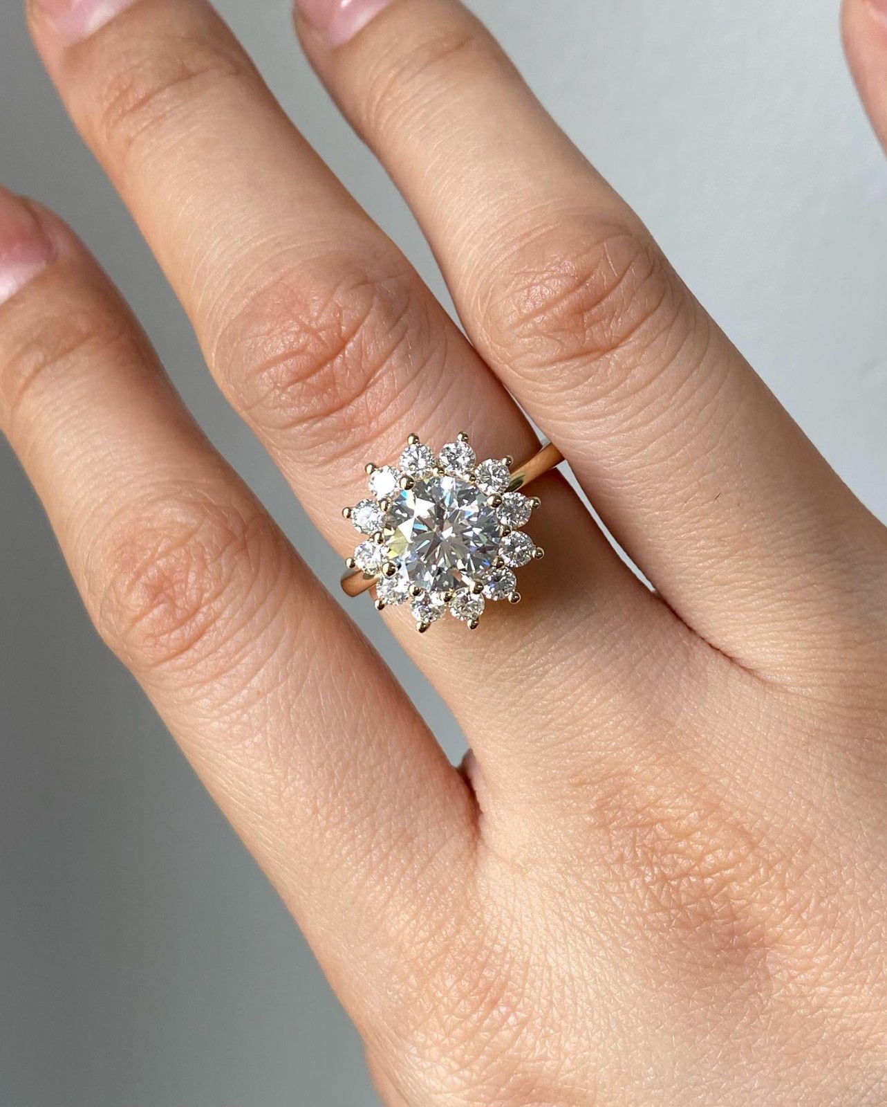 Round Cut Simulated Diamond Halo Style Engagement Ring in 925 Sterling Silver
