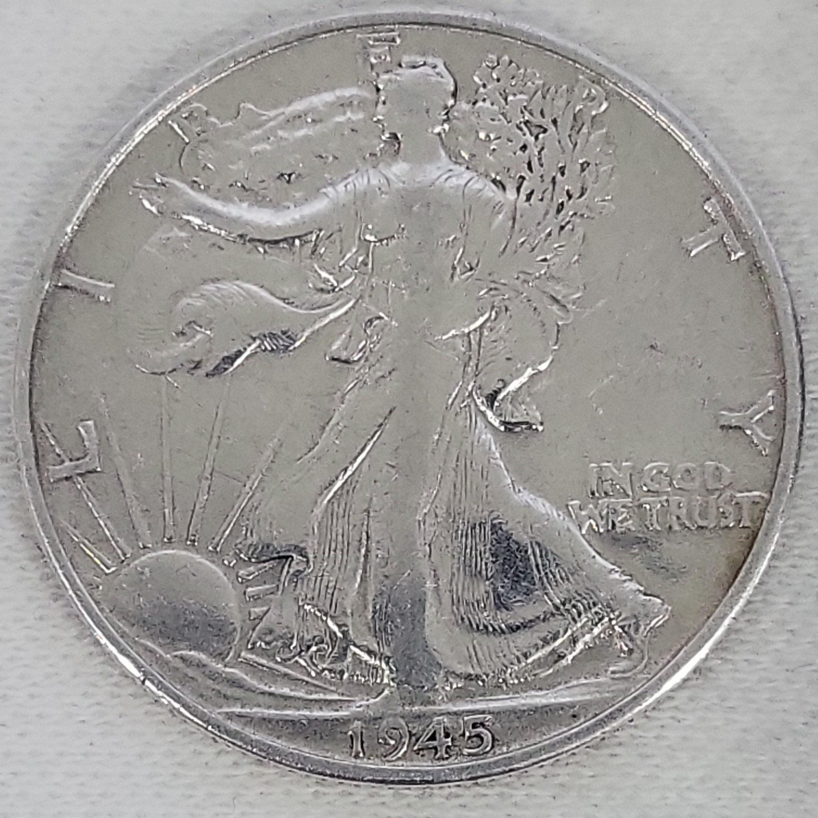1945 S Walking Liberty Half Dollar in VF Condition and it has been cleaned