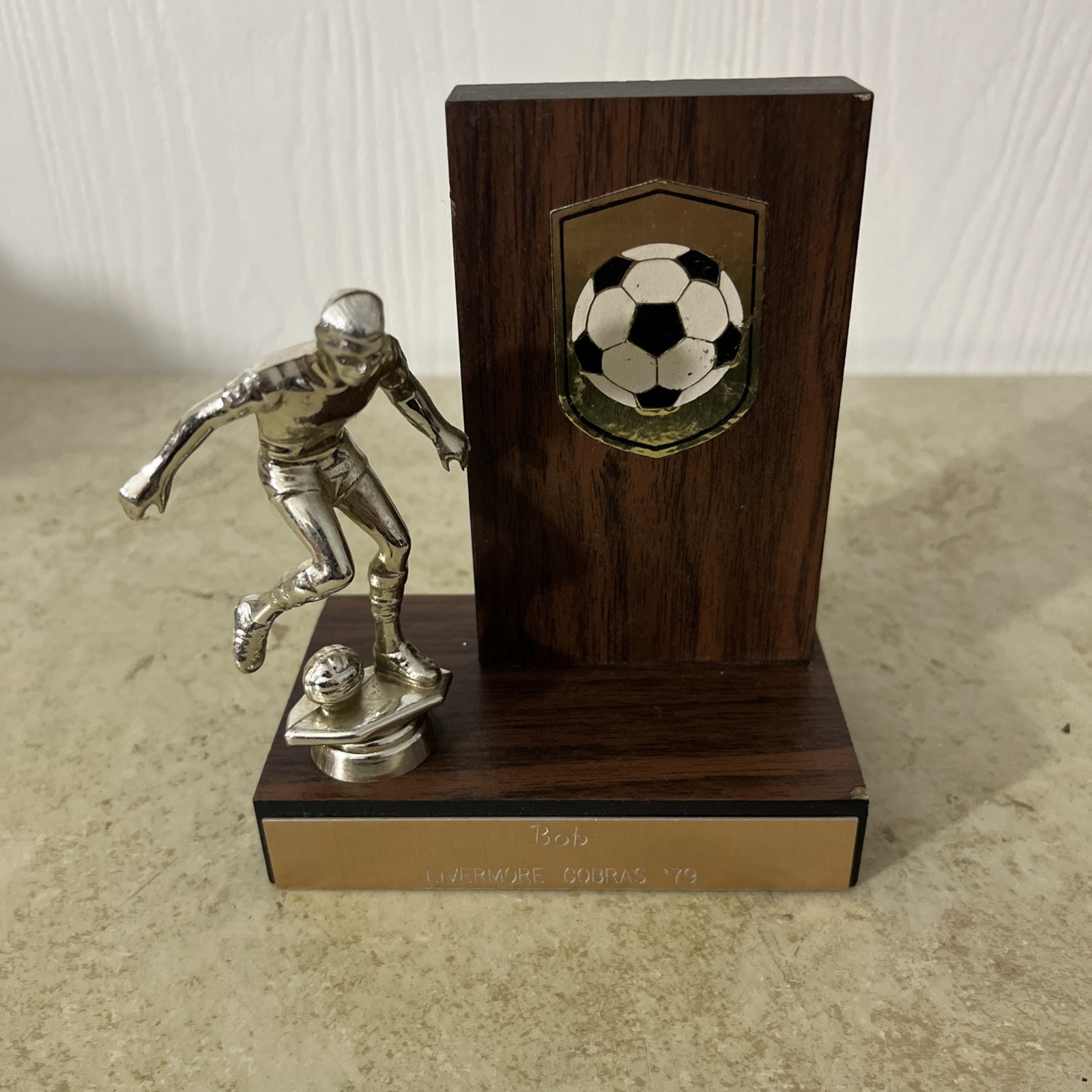 SOCCER TROPHY WOOD BASE SMALL MALE PLAYER 4.75”