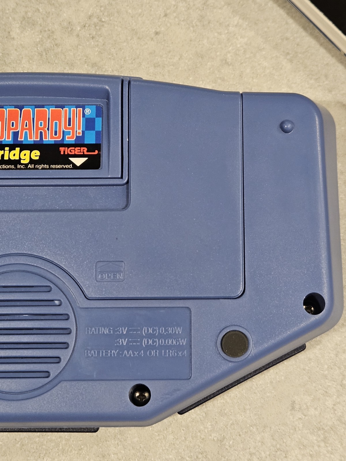 Tiger Electronics Jeopardy Hand Held Game 1995 with Answer Question Book