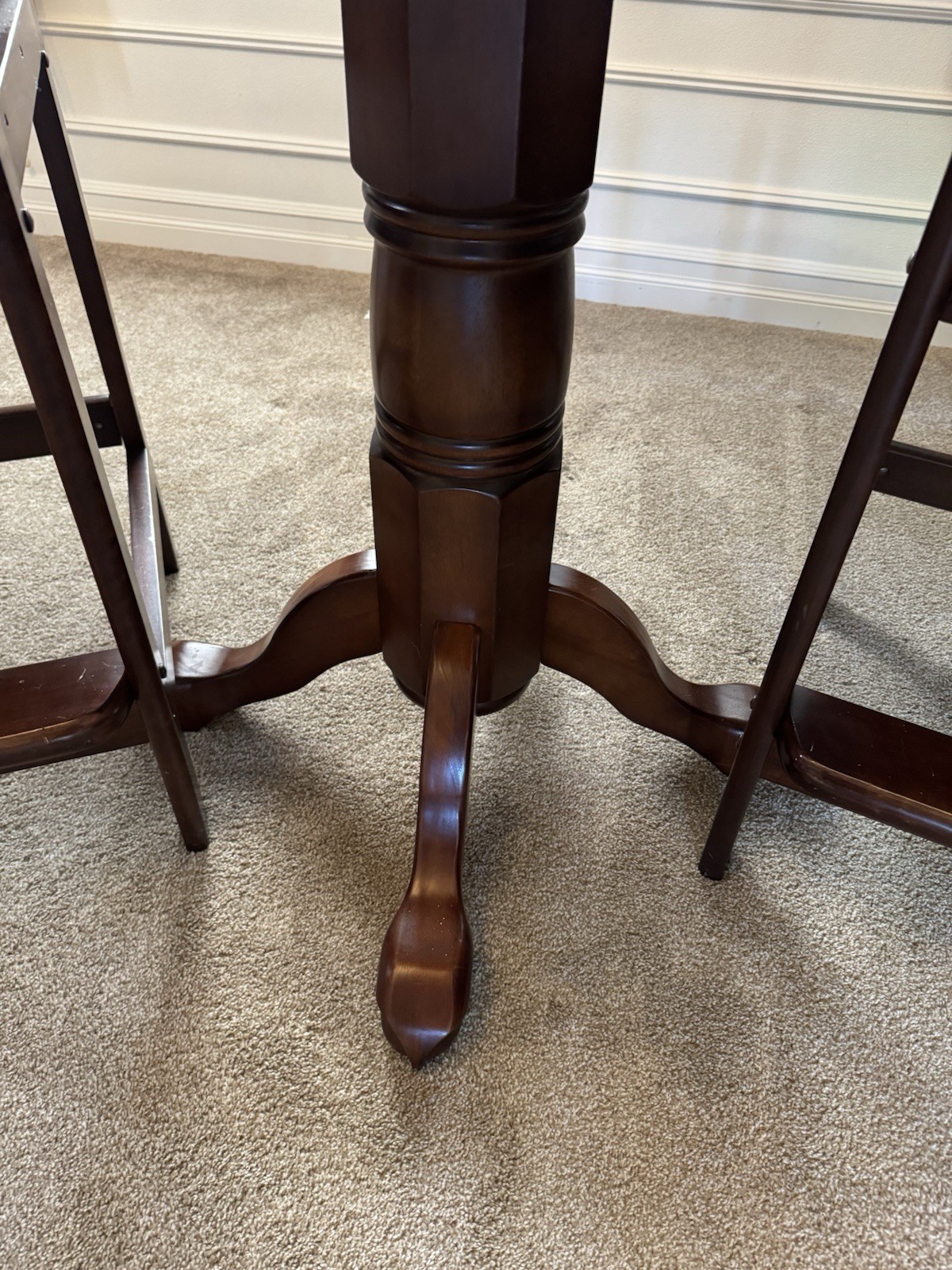 Pub table with kind of leather stools from Costco.