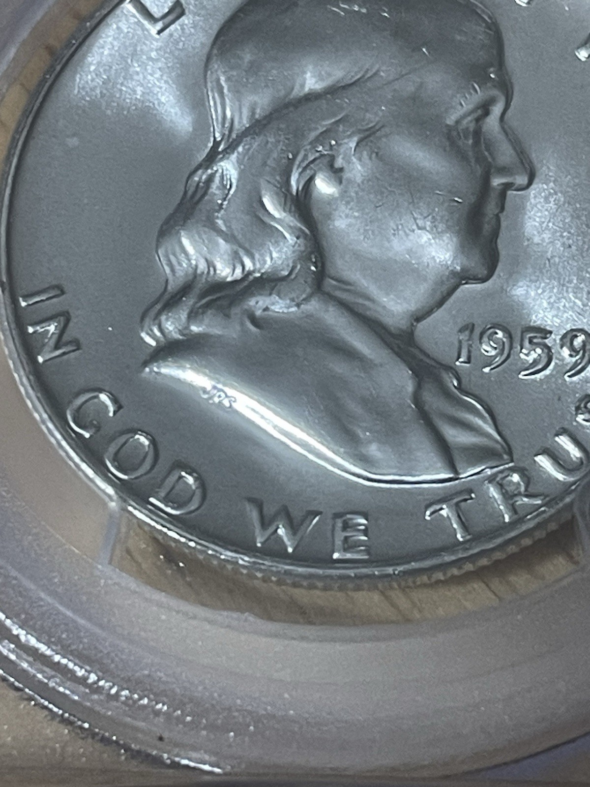 PCGS-certified 1959-D Franklin Half Dollar graded MS64 FBL (Full Bell Lines).