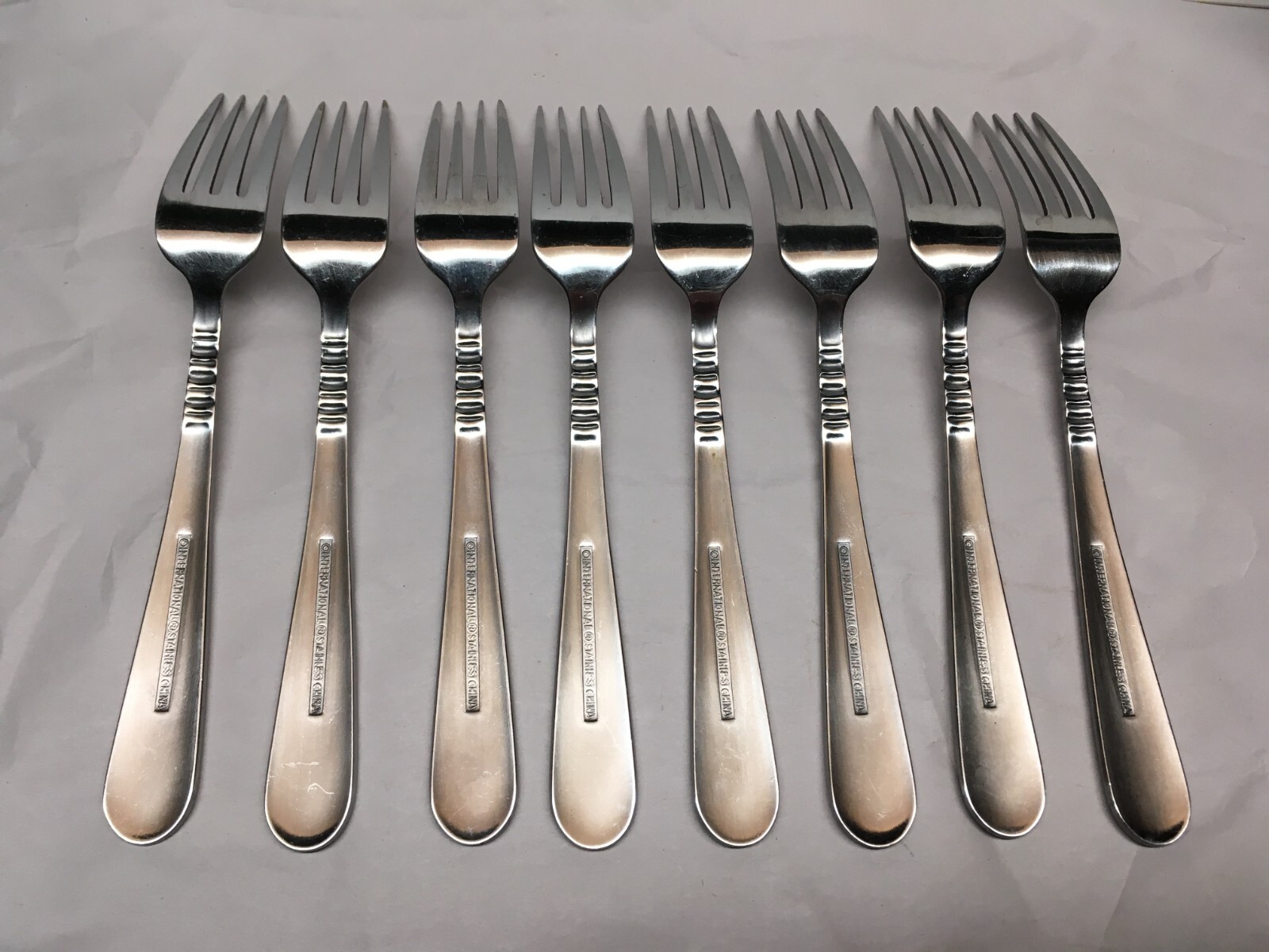 39pc International Stainless Flatware Ribbed Neck Vertical Lines China