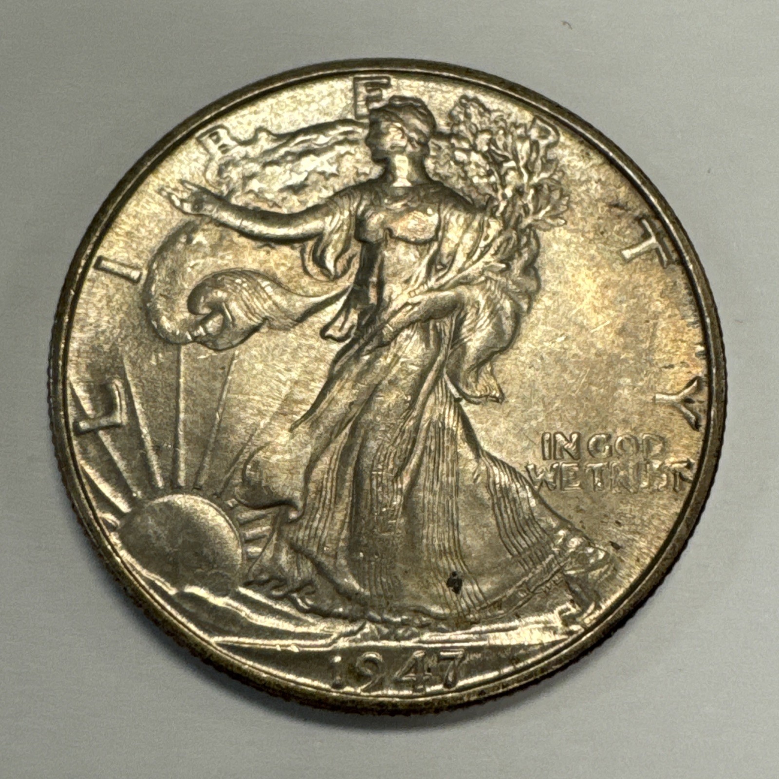 1947-D Walking Liberty Half Dollar Uncirculated-Toned