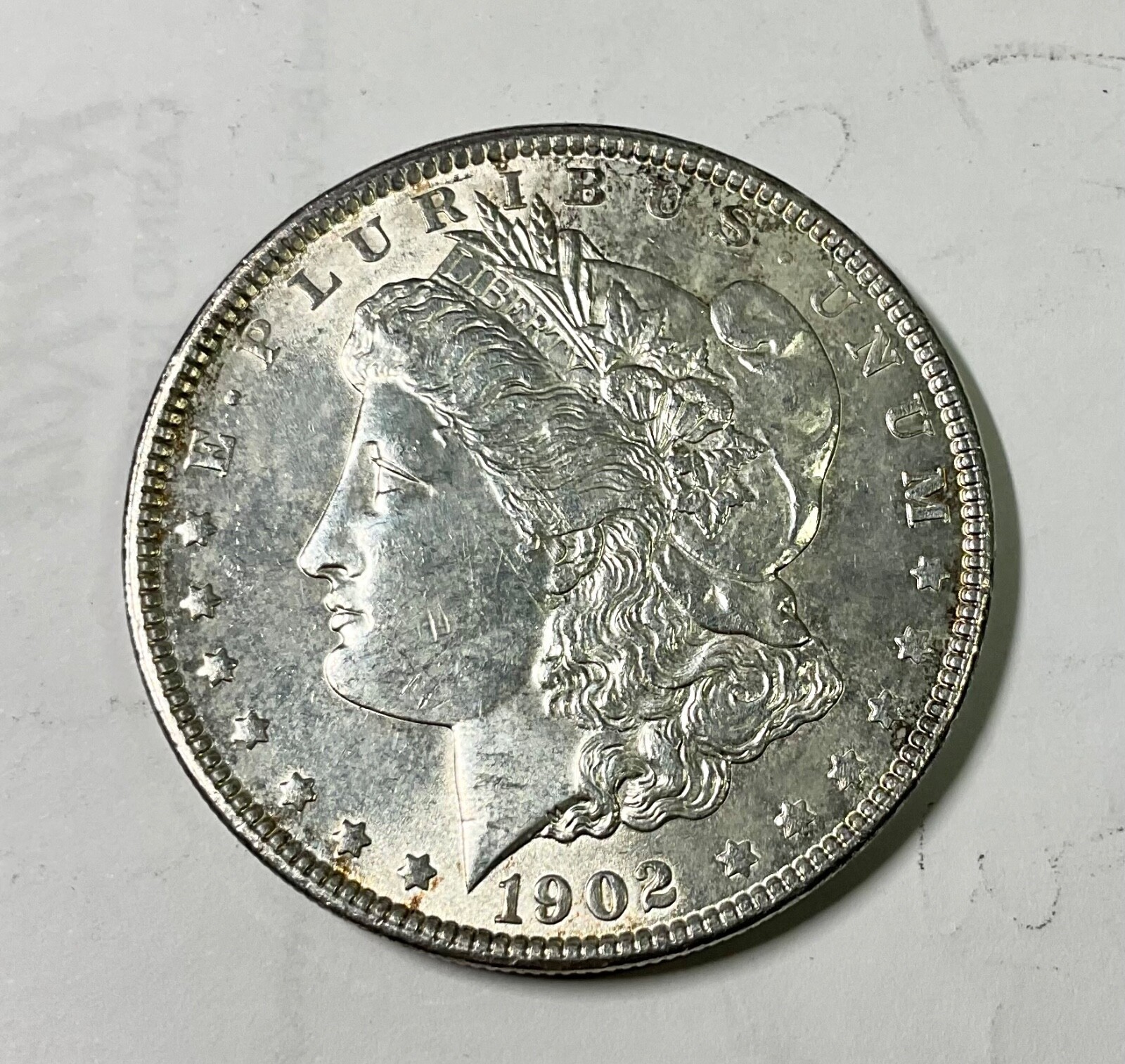 1902 Morgan Silver Dollar very pleasing Lustrous light circulated better date