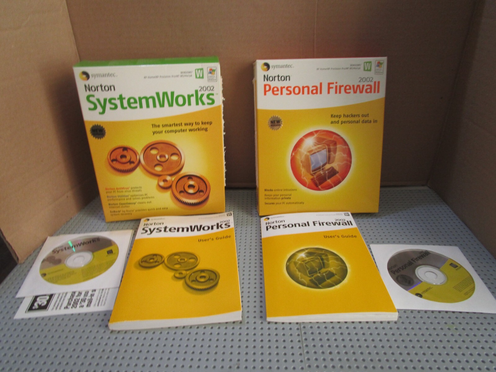 NORTON SYSTEM WORKS 2002 & NORTON PERSONAL FIREWALL 2002-FOR WINDOWS--CD ROM--EC