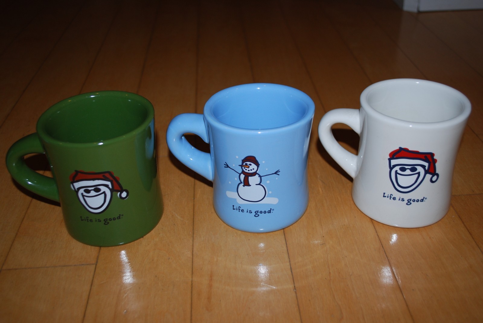 Life Is Good Coffee Mugs Set of 3, 2 Santa Jake’s & 1 Snowman Green Blue White