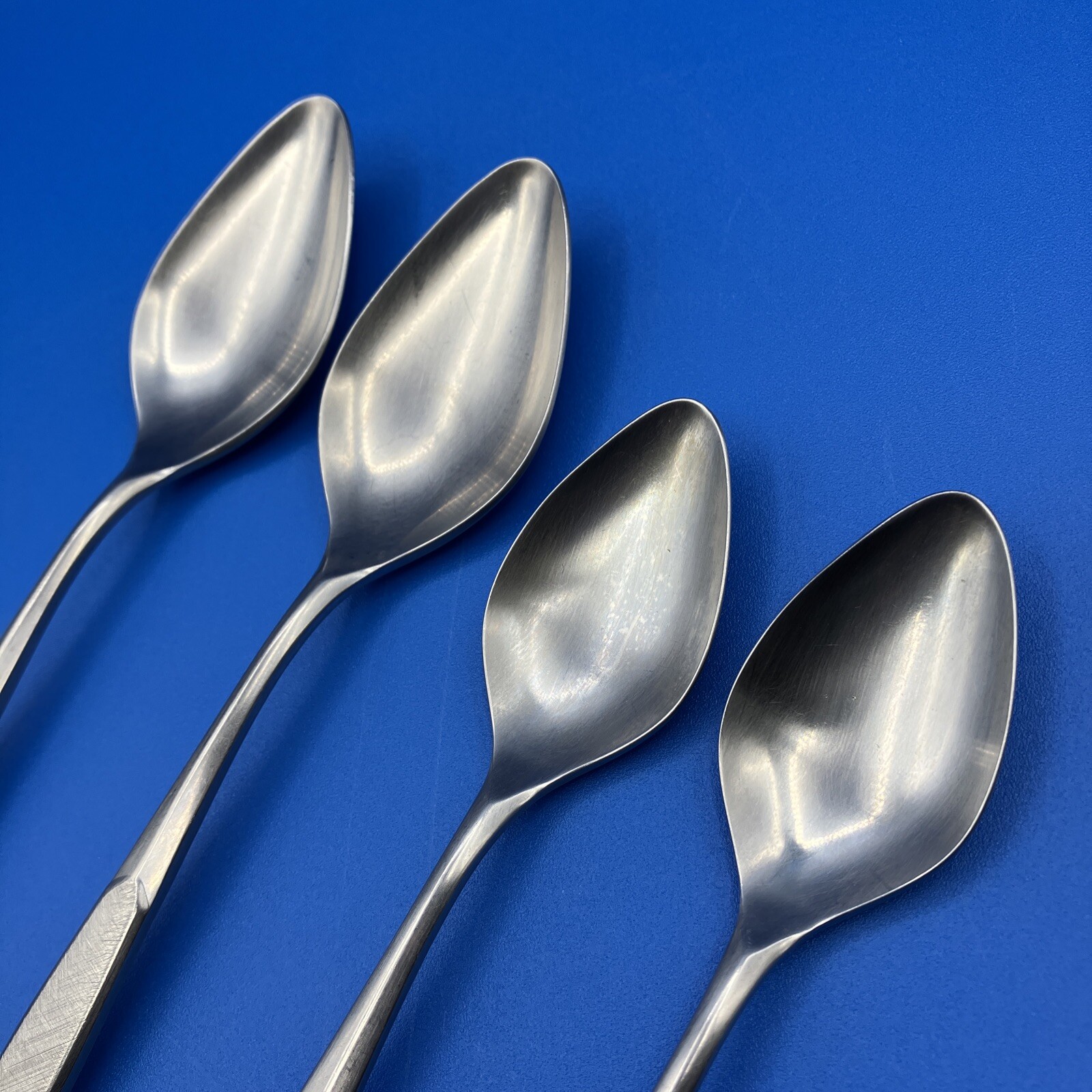 (4)International Deluxe SATURNA Satin Stainless SPOONS Burnished Handle Flatware
