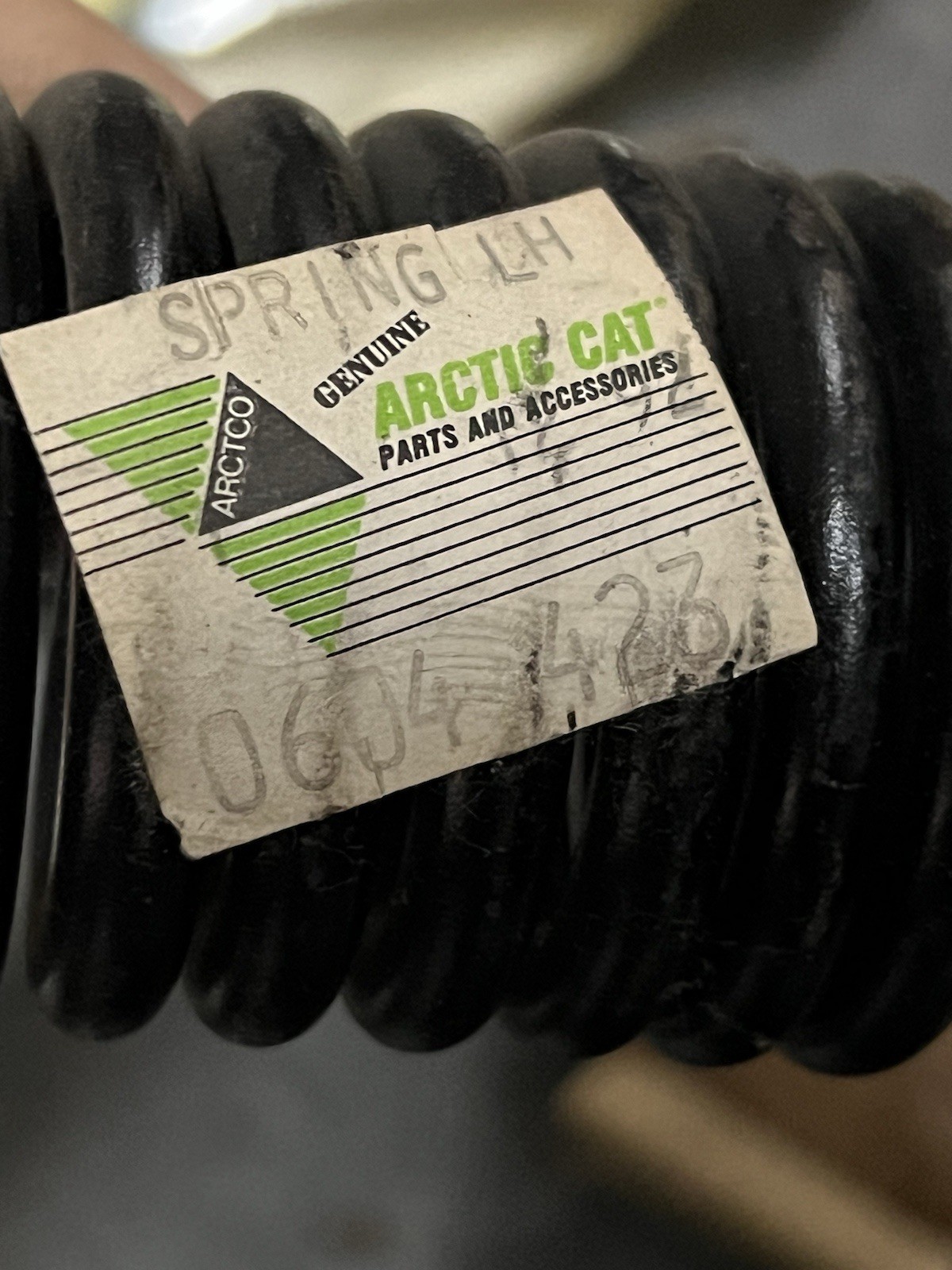 0604-423 Arctic Cat Spring LH OEM NOS