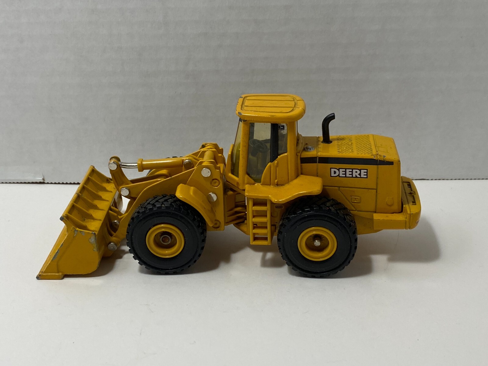 John Deer ERTL Loader, 7" in length, Yellow Die Cast, Pre-Owned