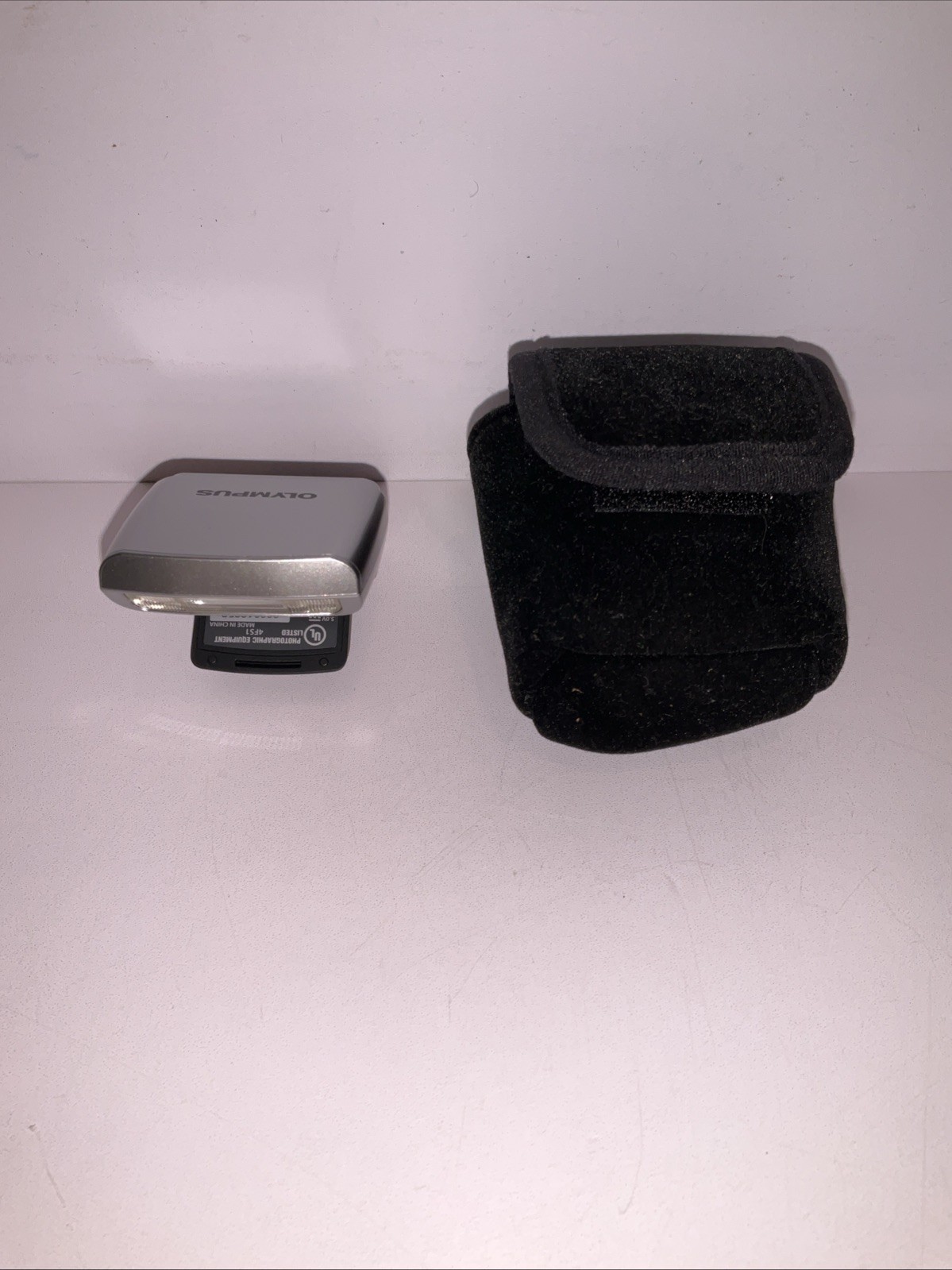 Compact FL-M1 Electronic Camera Flash in good working condition.