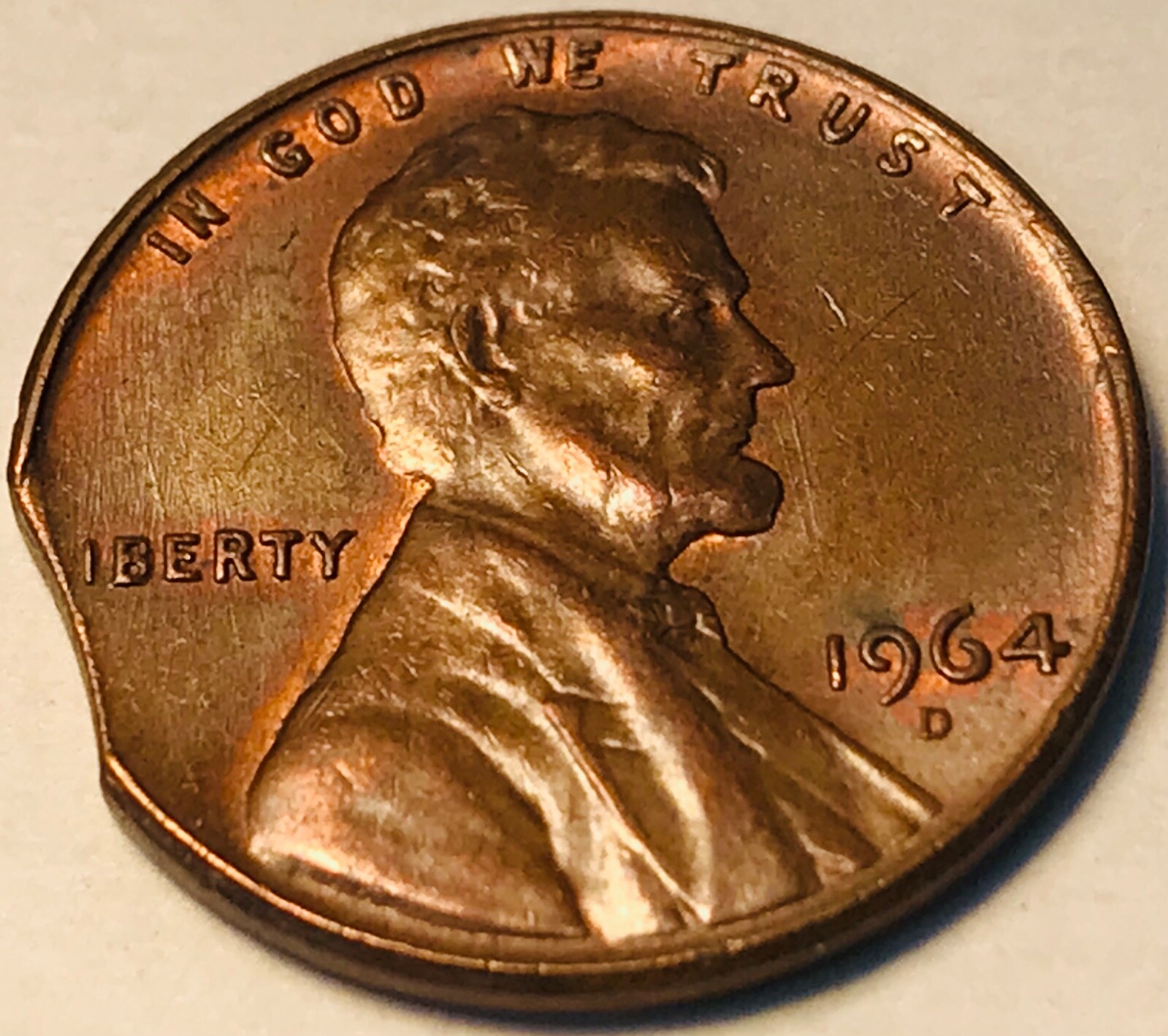 1964 D Lincoln cent with curved clip Unc, lots of red