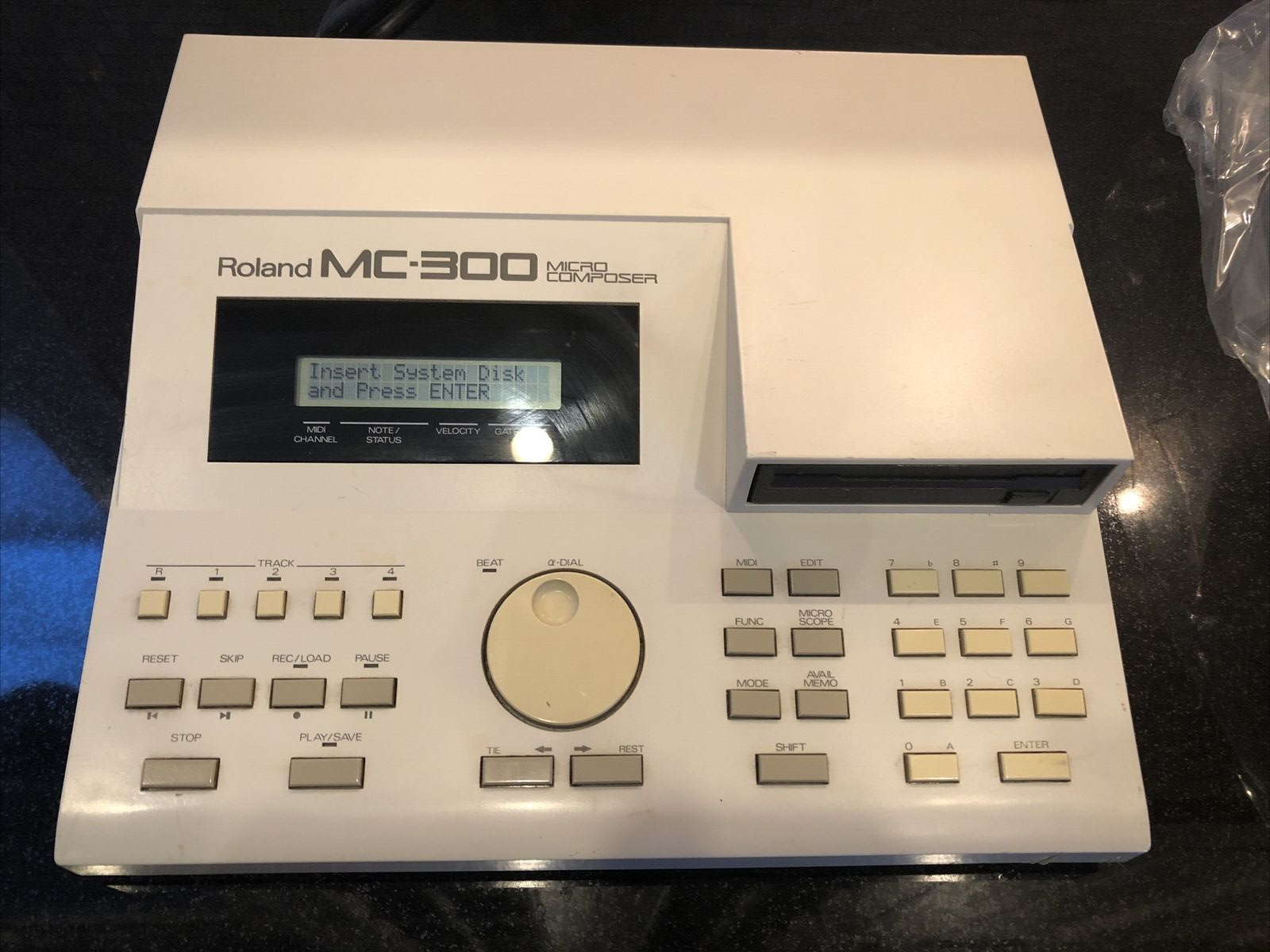 Roland MC-300 MICRO COMPOSER Midi Sequencer with Manual & Roland System ￼Disc