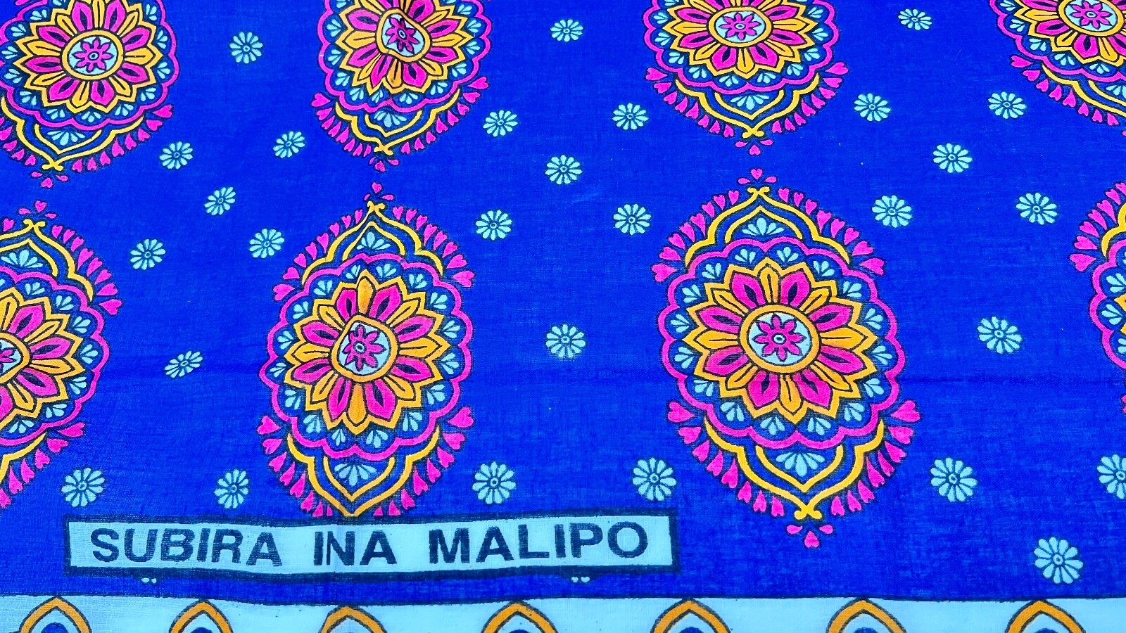 African Textiles, One Hitarget Wax Block Print, and Two Khanga Cloths