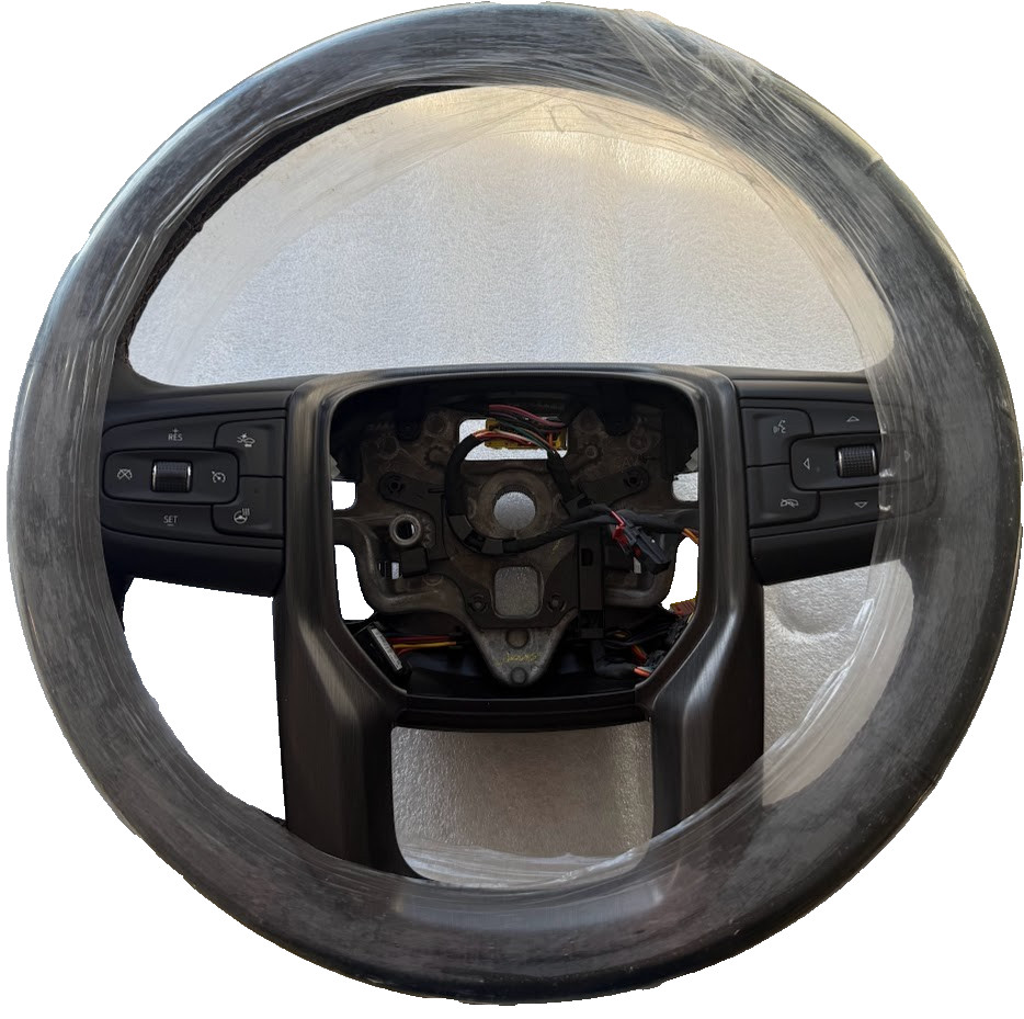 OEM black tan heated steering wheel for some 2019+ Sierra trucks. AT4 vulcan