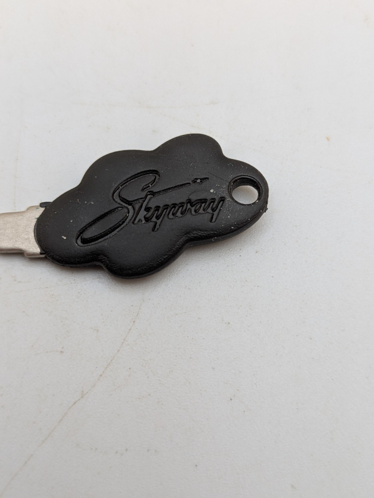 Skyway Luggage Key with Black Cloud Shaped End