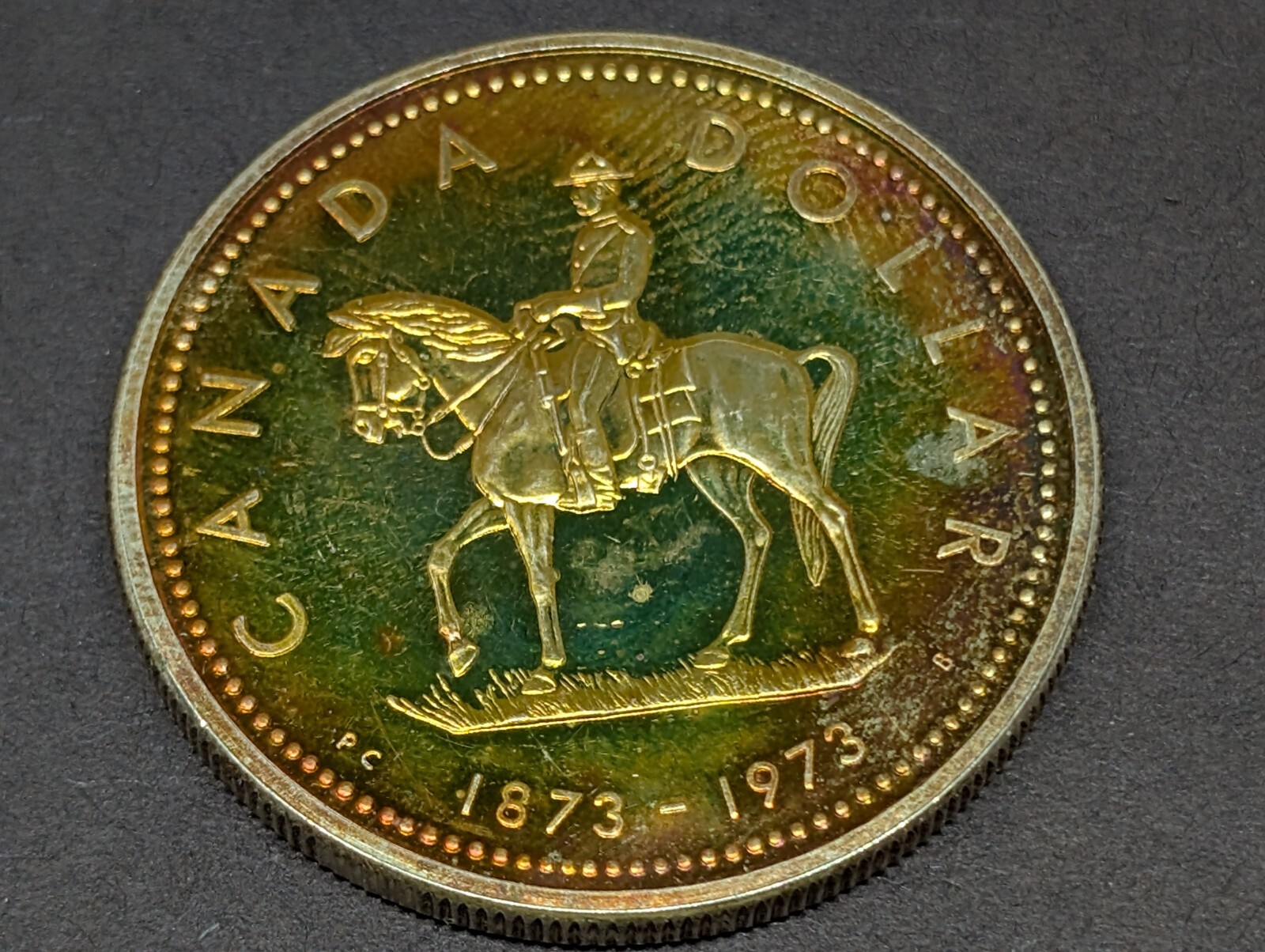 1973 Canada Silver Dollar $1 Toned Reverse 250430