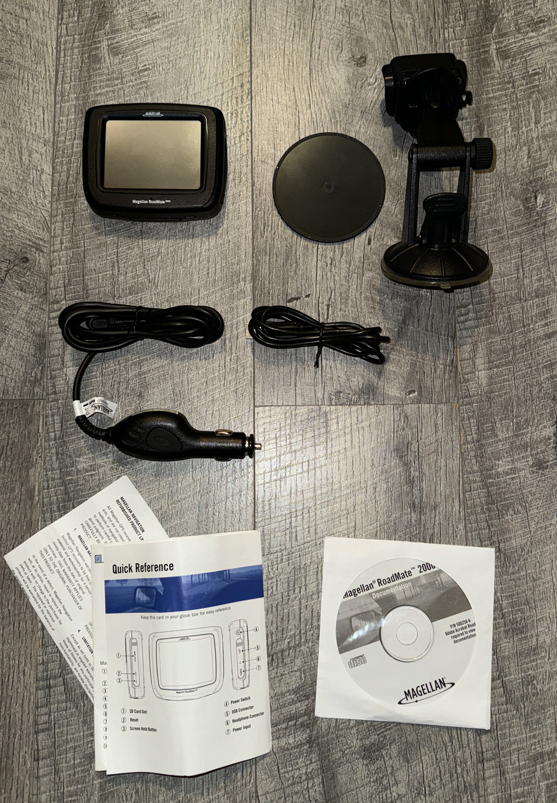 Magellan RoadMate 2000 GPS w/ Car Charger, Manual, Software, & Windshield Mount