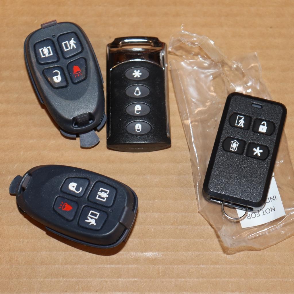 Lot of New Used Alarm Remote Control Panic Buttons? FOBS As seen in photos